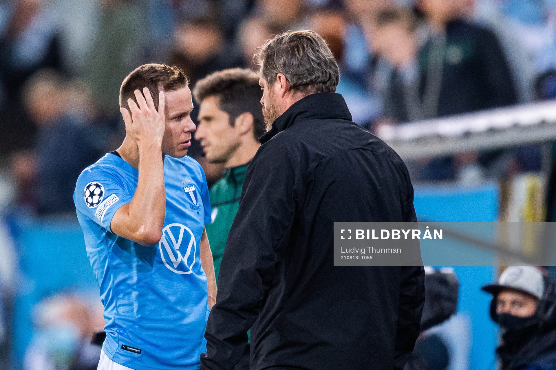 Niklas Moisander of Malmö FF leaves the pitch due to injury