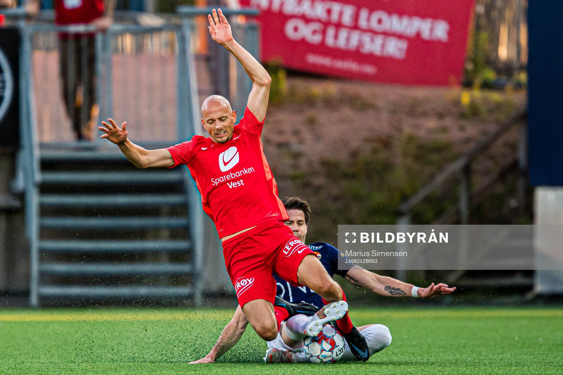 Ruben Kristiansen of Brann and Lars-Christopher Horst Jan Vilsvik of Strømsgodset during the Eliteserien match between Strømsgodset and Brann on August 21, 2021 in Drammen.