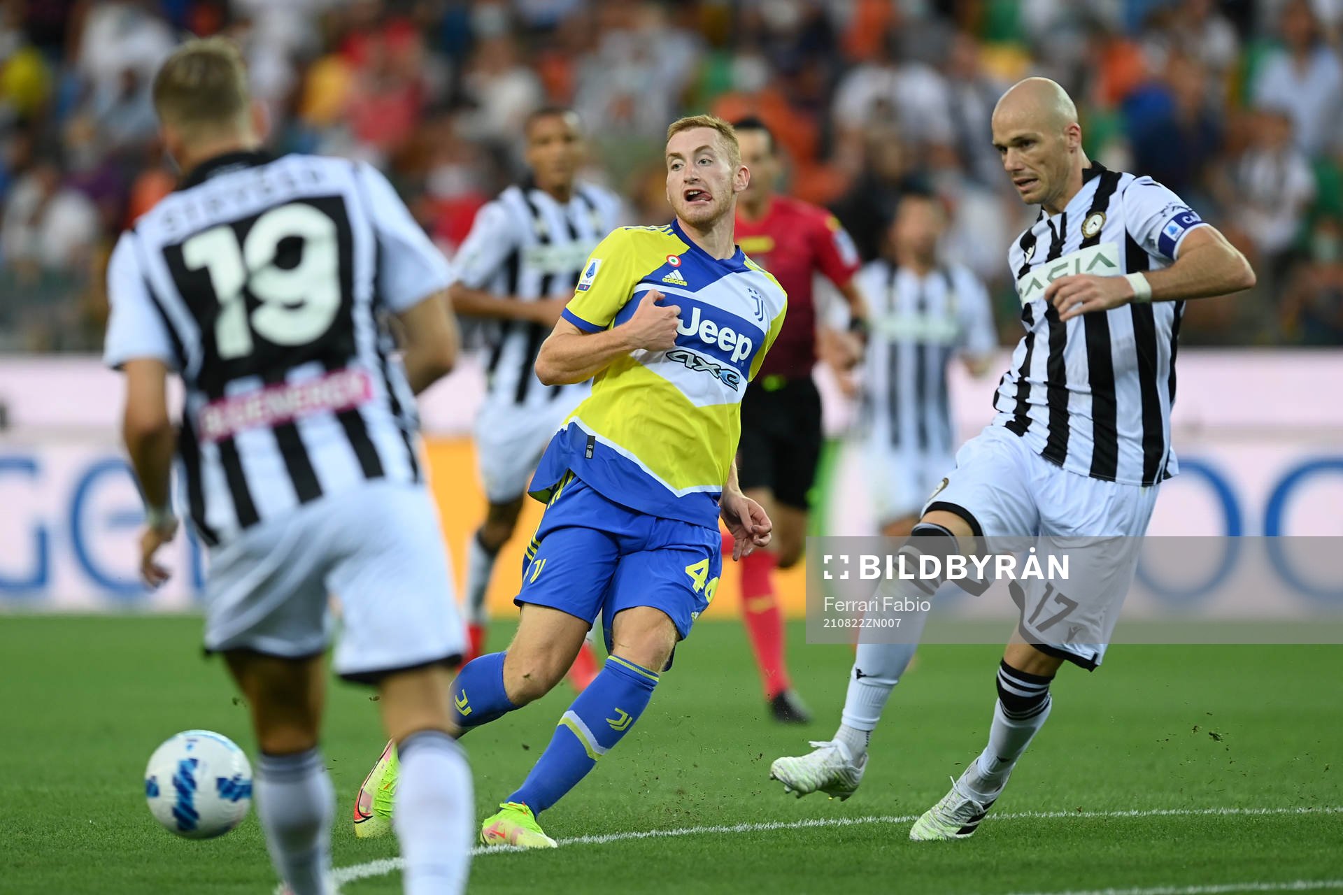 Dejan Kulusevski of Juventus and Bram Nuytinck of udinese during the football match in Serie A between Udinese and Juventus on August 22, 2021 in Udine. 