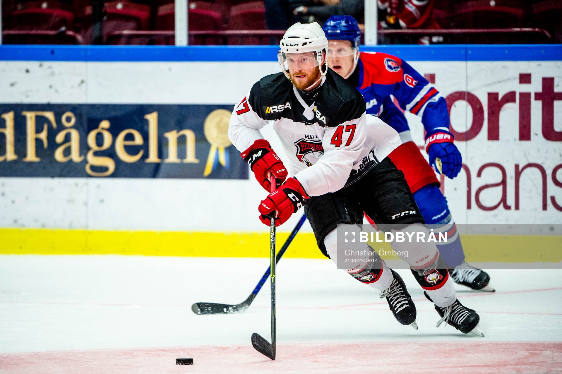 Malmö Redhawks Joakim Ryan och Oskarshamns Fredrik Olofsson