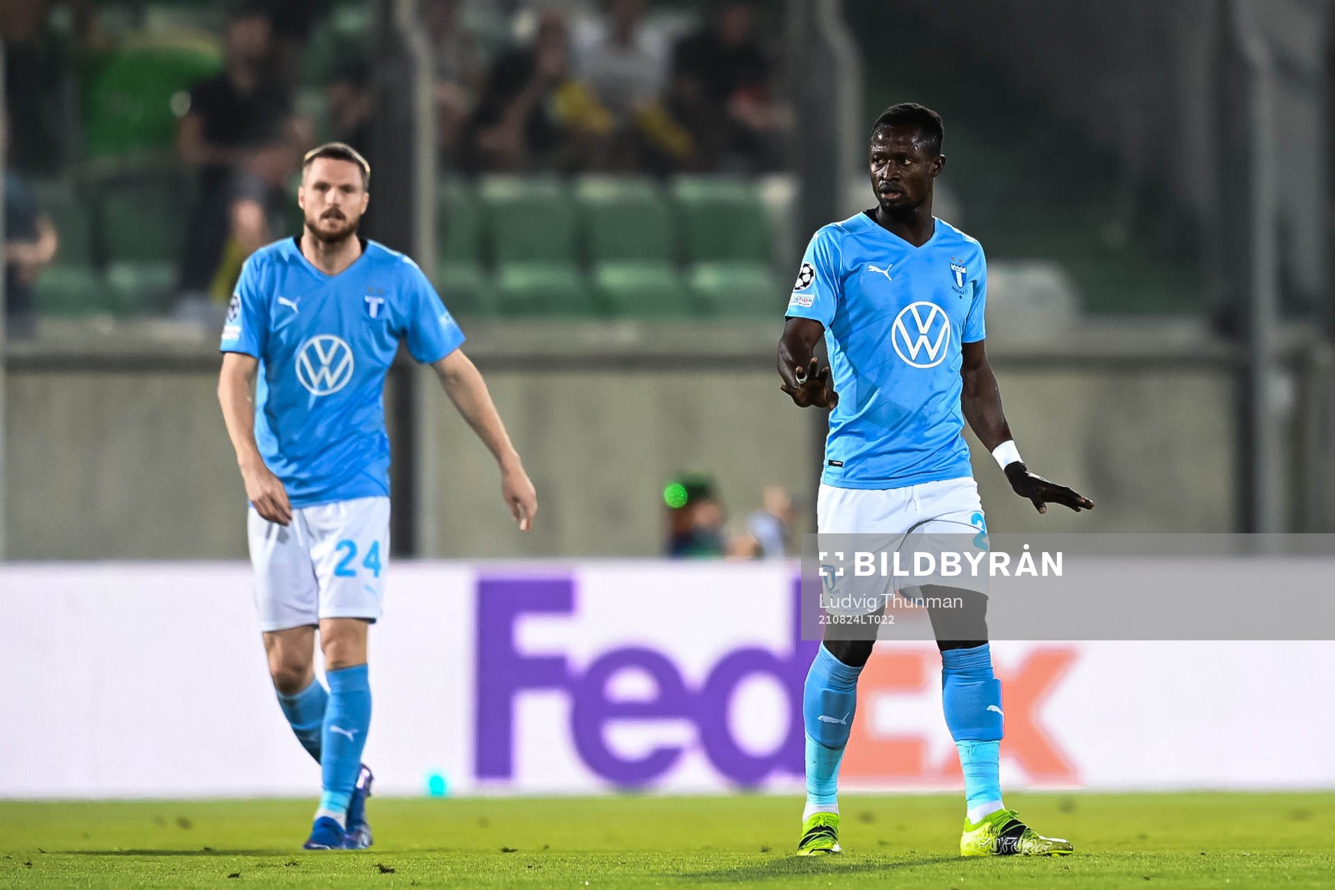Lasse Nielsen and Bonke Innocent of Malmö FF look dejected