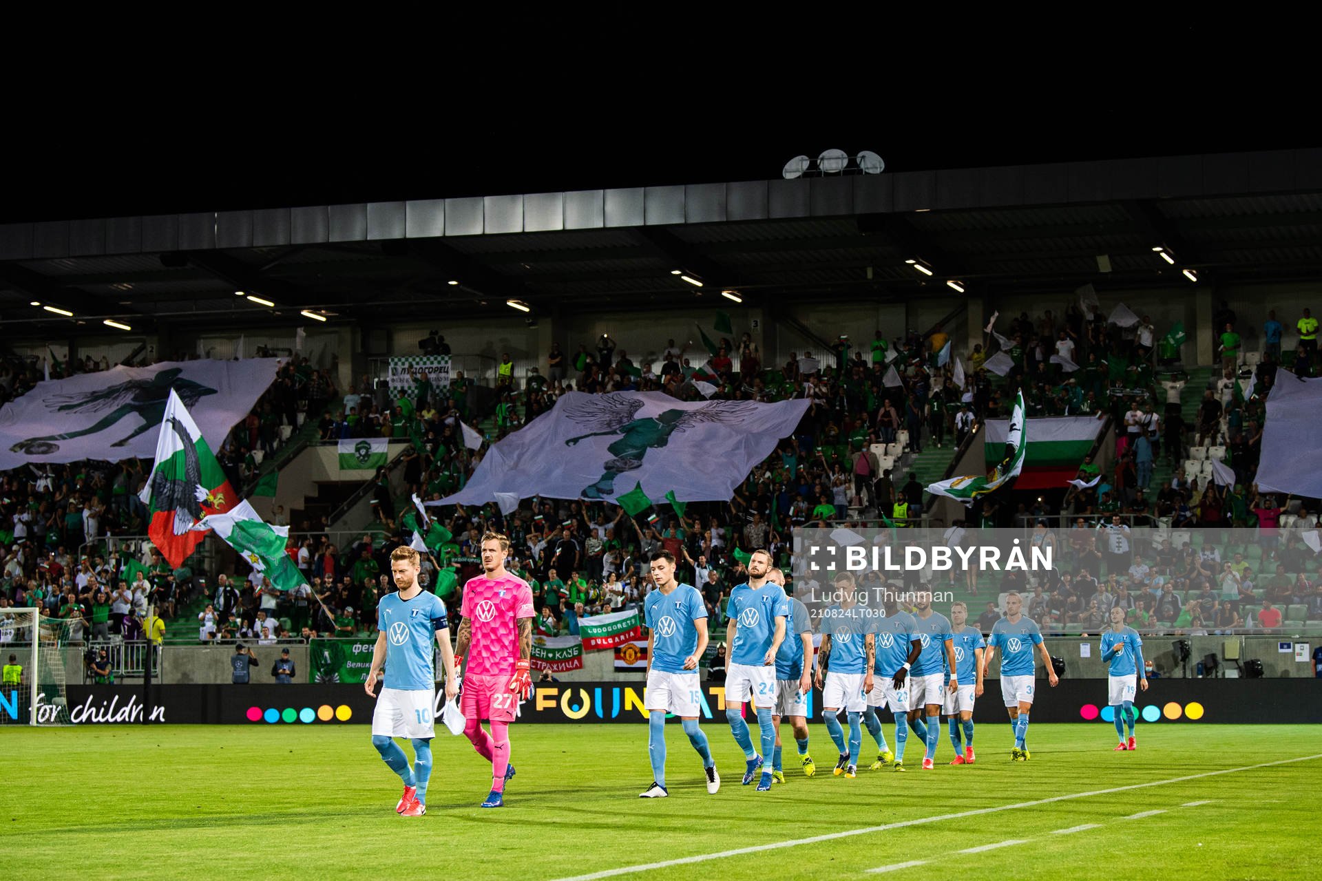 Players of Malmö FF enter the pitch