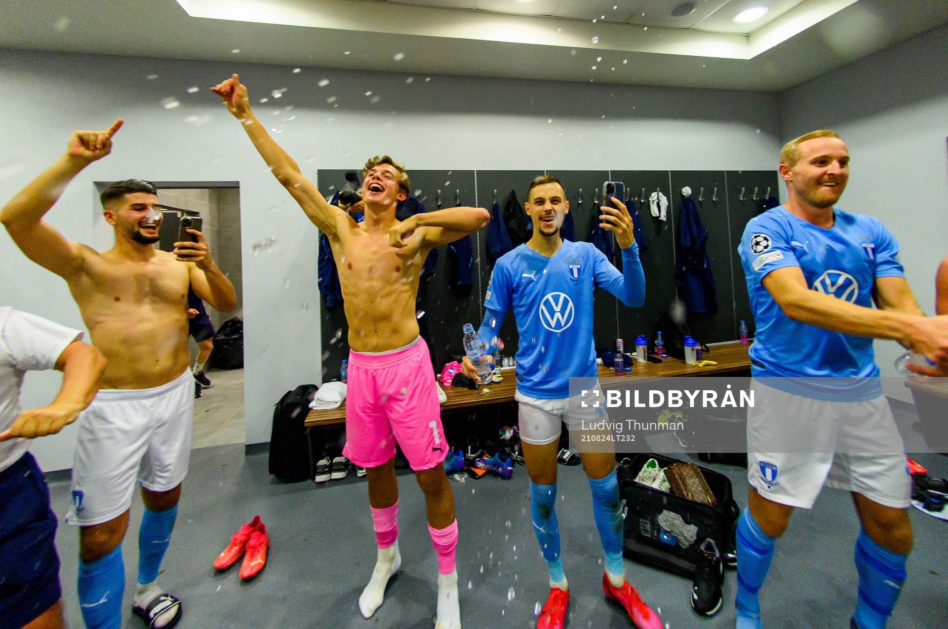 Players of Malmö FF celebrate in the locker room