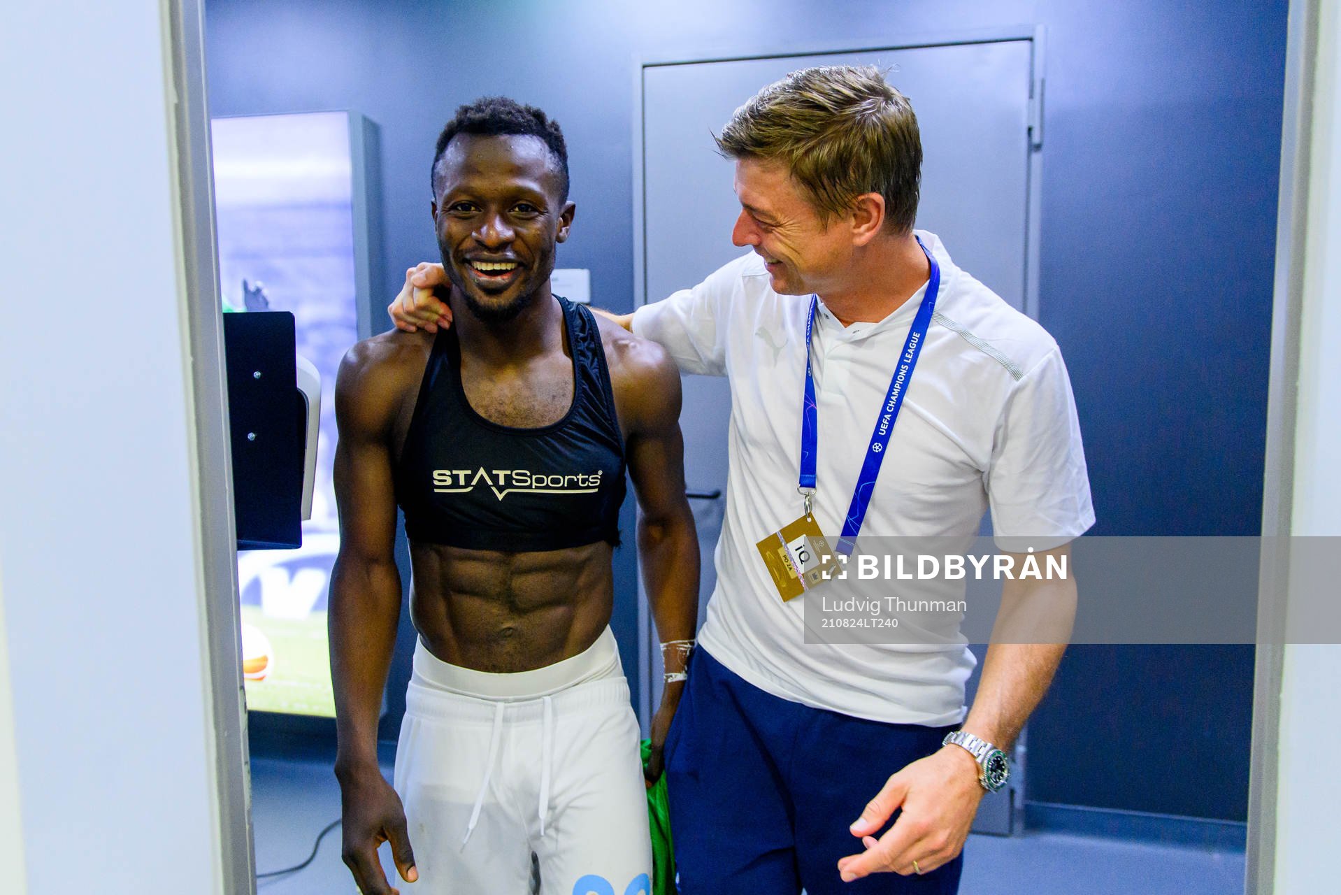 Bonke Innocent and Jon Dahl Tomasson, head coach of Malmö FF celebrate in the locker room after winning the UEFA Champions League playoff match between Ludogorets and Malmö FF on August 24, 2021 in Razgrad.