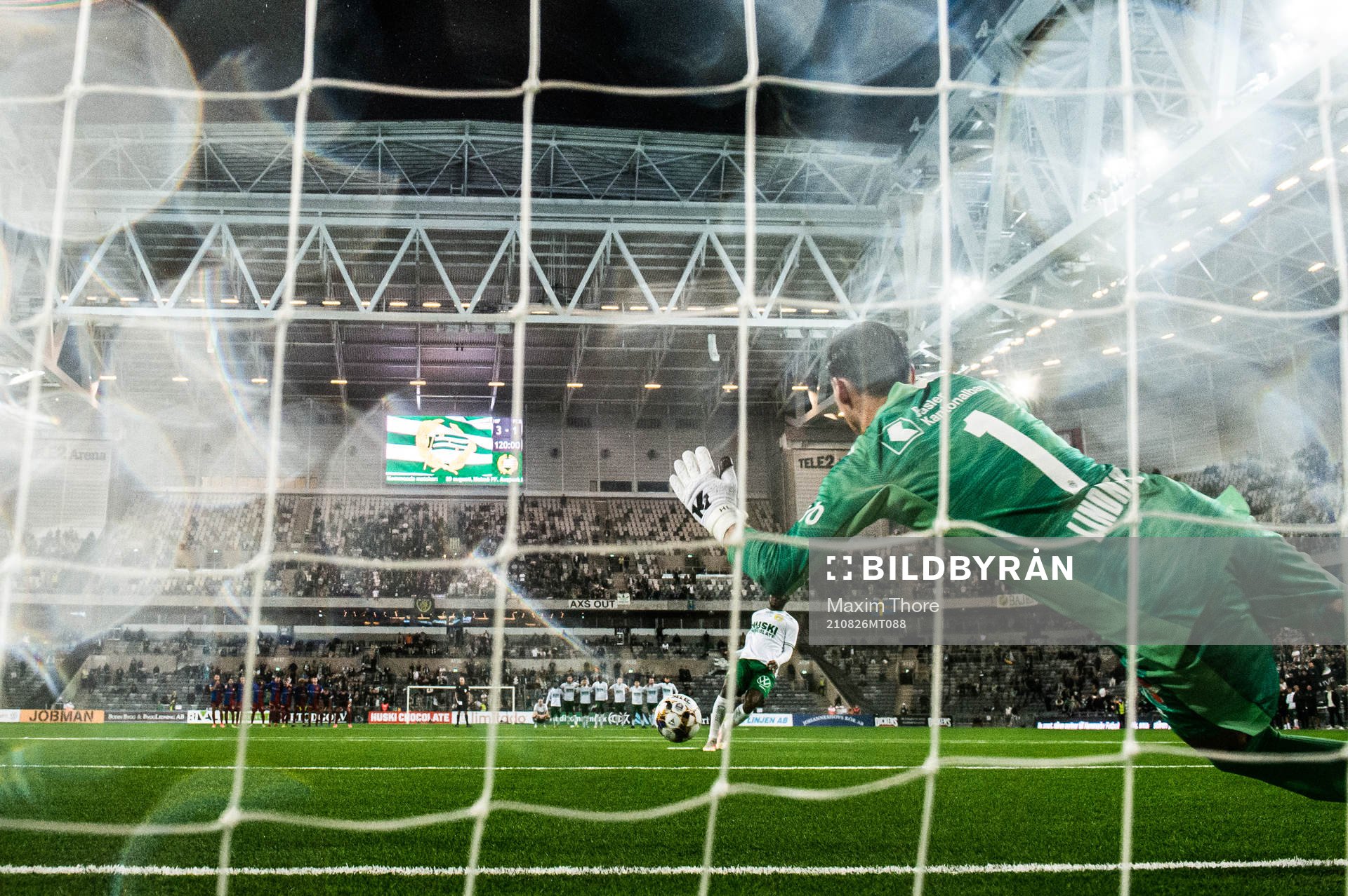 David Accam of Hammarby scores a penalty behind goalkeeper