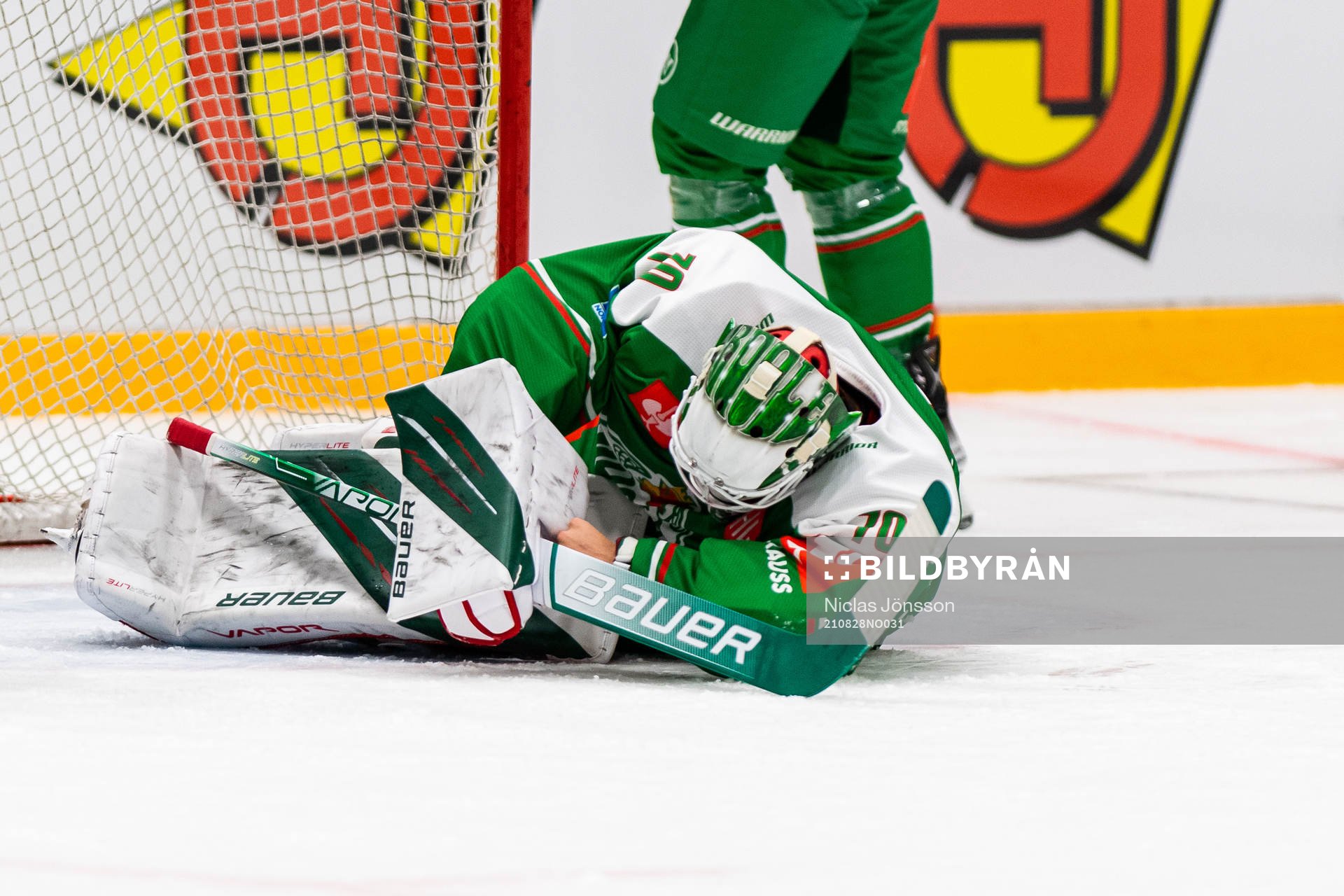 Goalkeeper Calle Clang of Rögle in pain