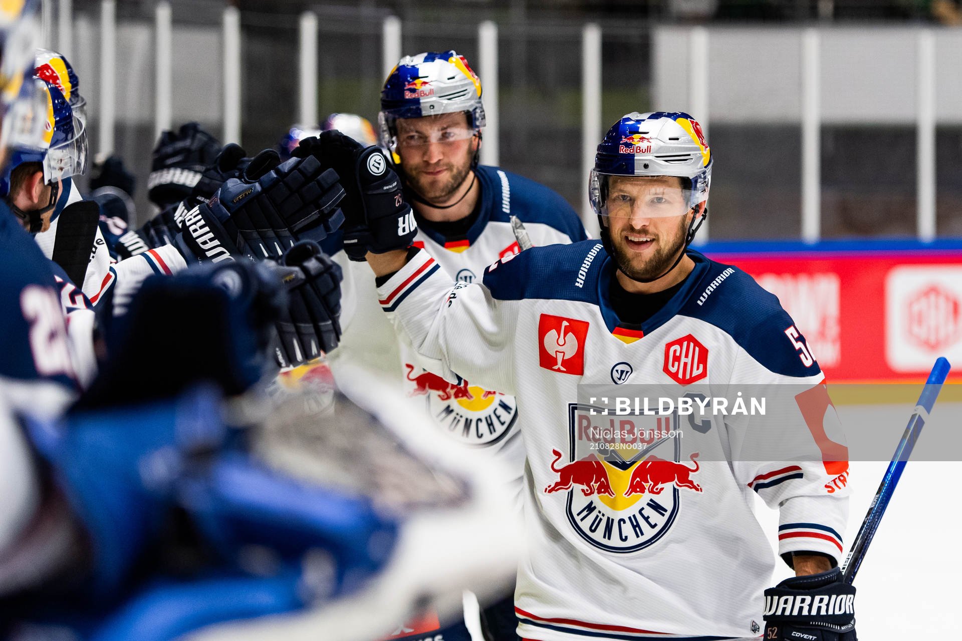 Patrick Hager of Munich celebrates scoring 2-3