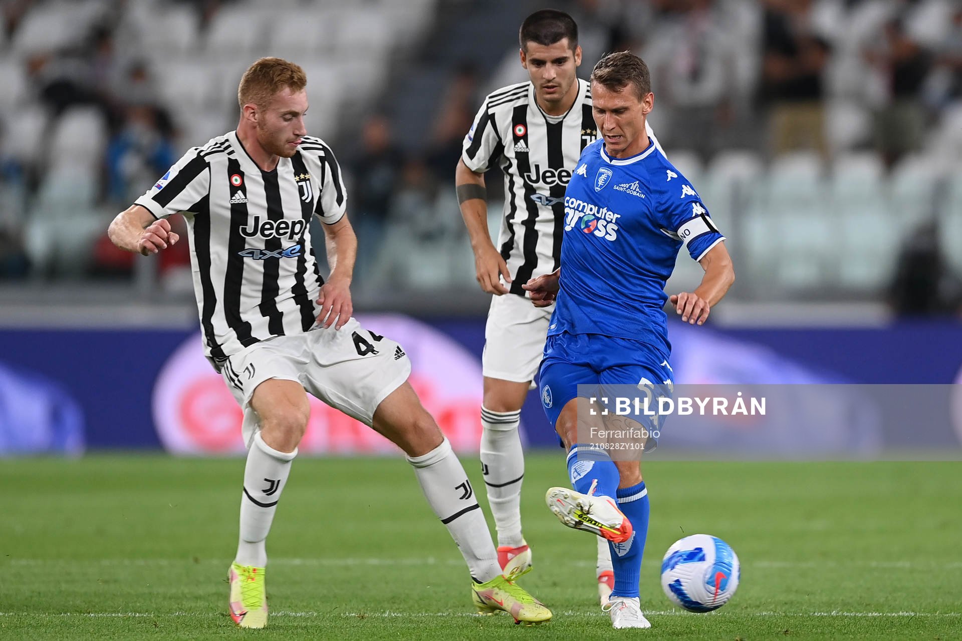Dejan Kulusevski of Juventus and Leo Stulac of Empoli