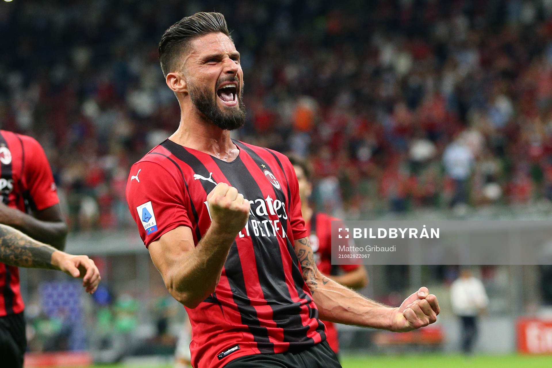 Olivier Giroud of Milan celebrates scoring a goal