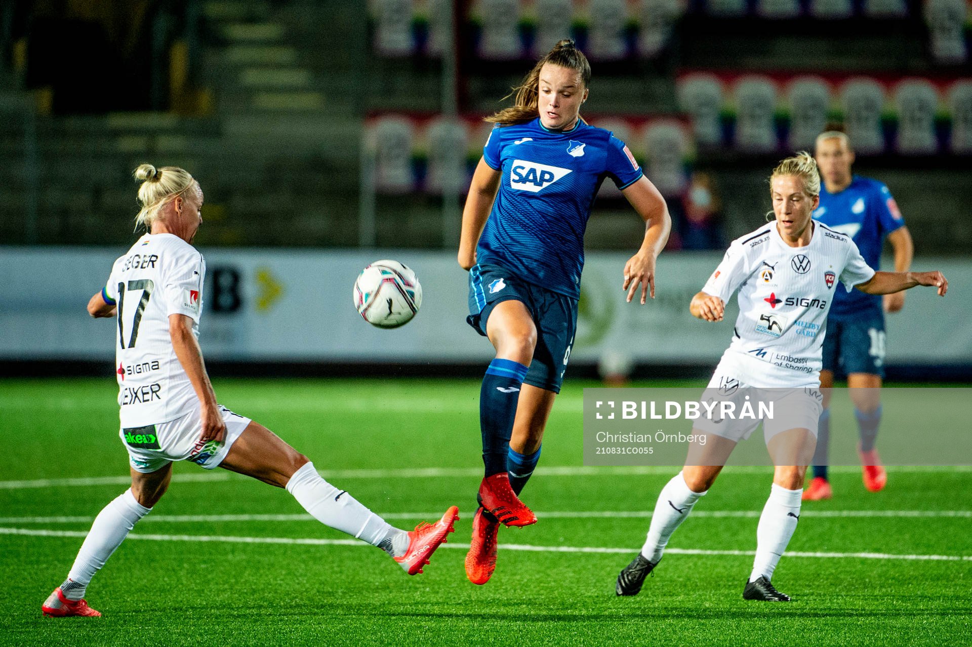 Tine Lea De Caigny of Hoffenheim and Caroline Seger and Mia