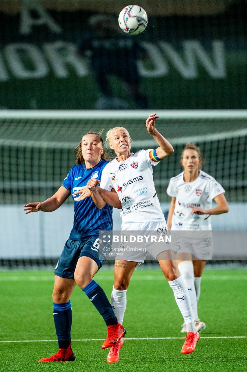 Tine Lea De Caigny of Hoffenheim and Caroline Seger of