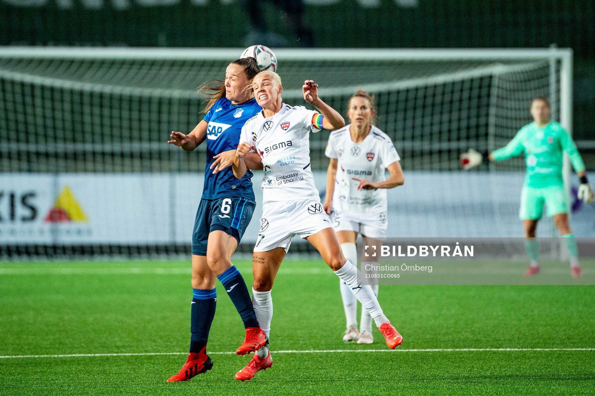 Tine Lea De Caigny of Hoffenheim and Caroline Seger of