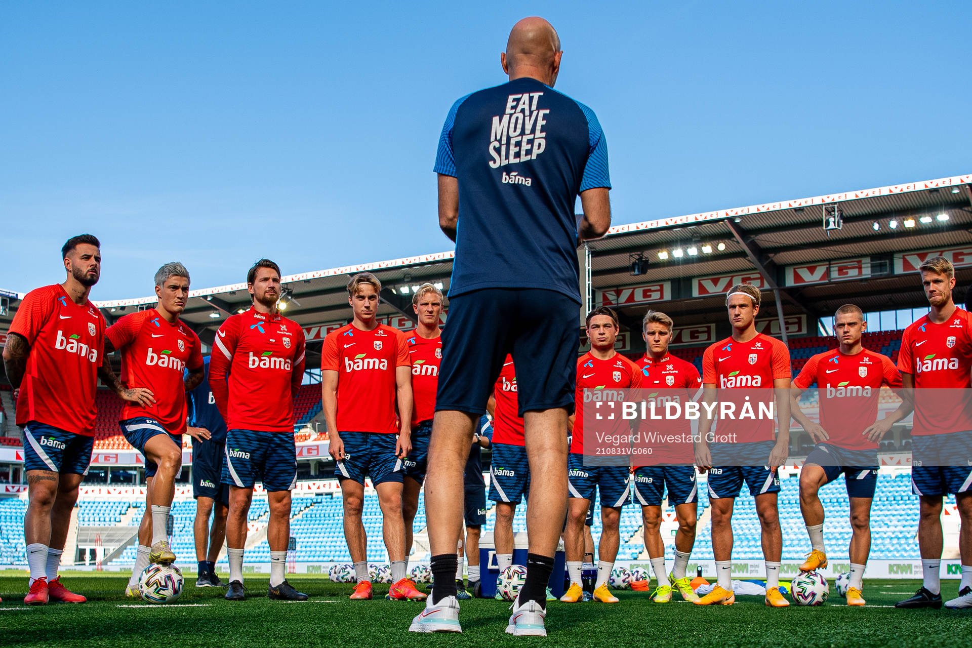 Aron Dønnum, Mathias Normann, Stefan Strandberg, Kristian Thorstvedt, Morten Thorsby, Patrick Berg, Martin Ødegaard, Erik Botheim, Julian Ryerson and Kristoffer Ajer listen to Ståle Solbakken, head coach of the Norwegian national football team, during a training session on August 31, 2021 in Oslo.