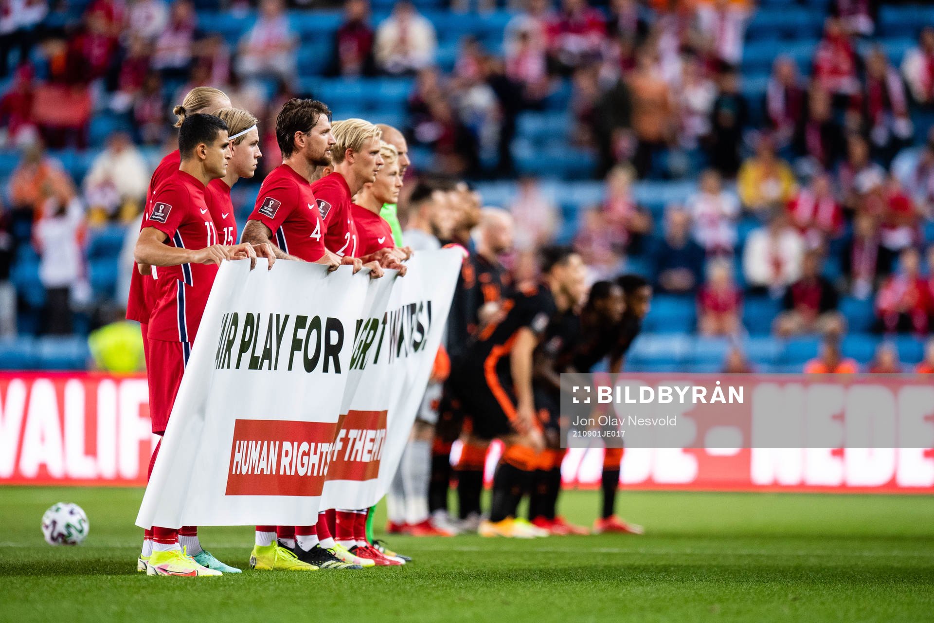 Players of Norway with a sign saying ”Fair Play for
