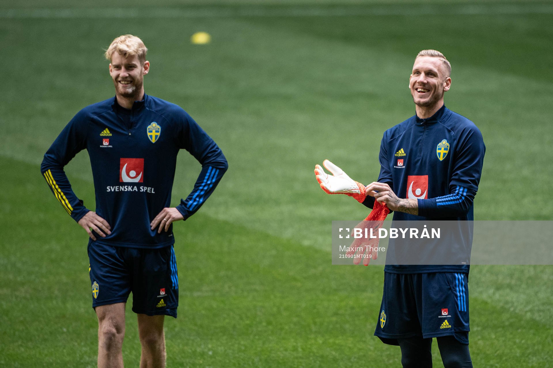 Filip Helander and goalkeeper Robin Olsen of the Swedish