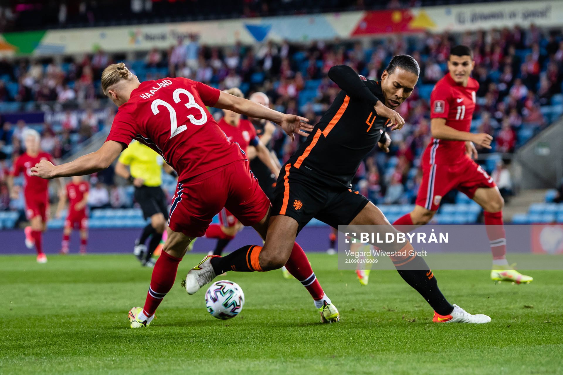 Erling Braut Haaland of Norway and Virgil van Dijk of