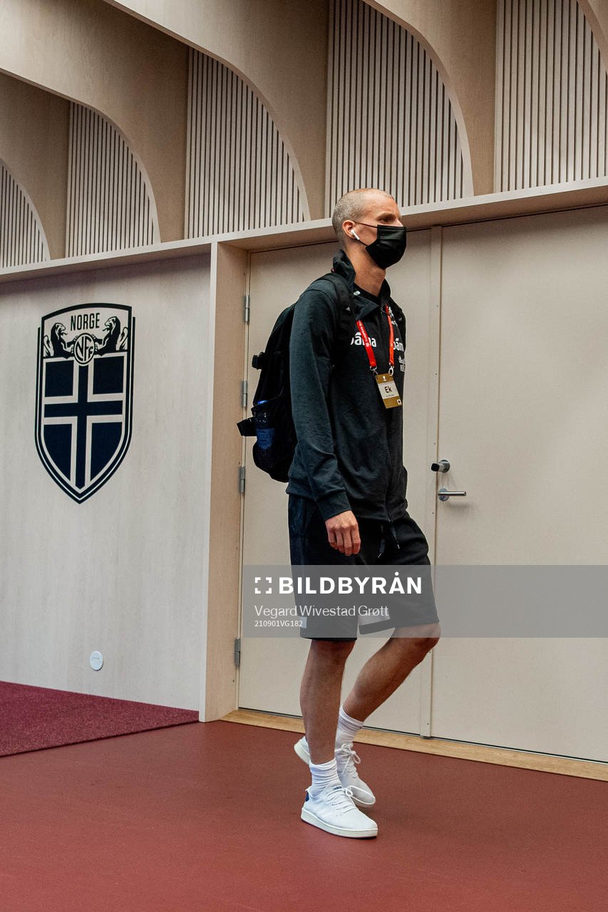 Goalkeeper André Hansen of Norway arrives wearing a face