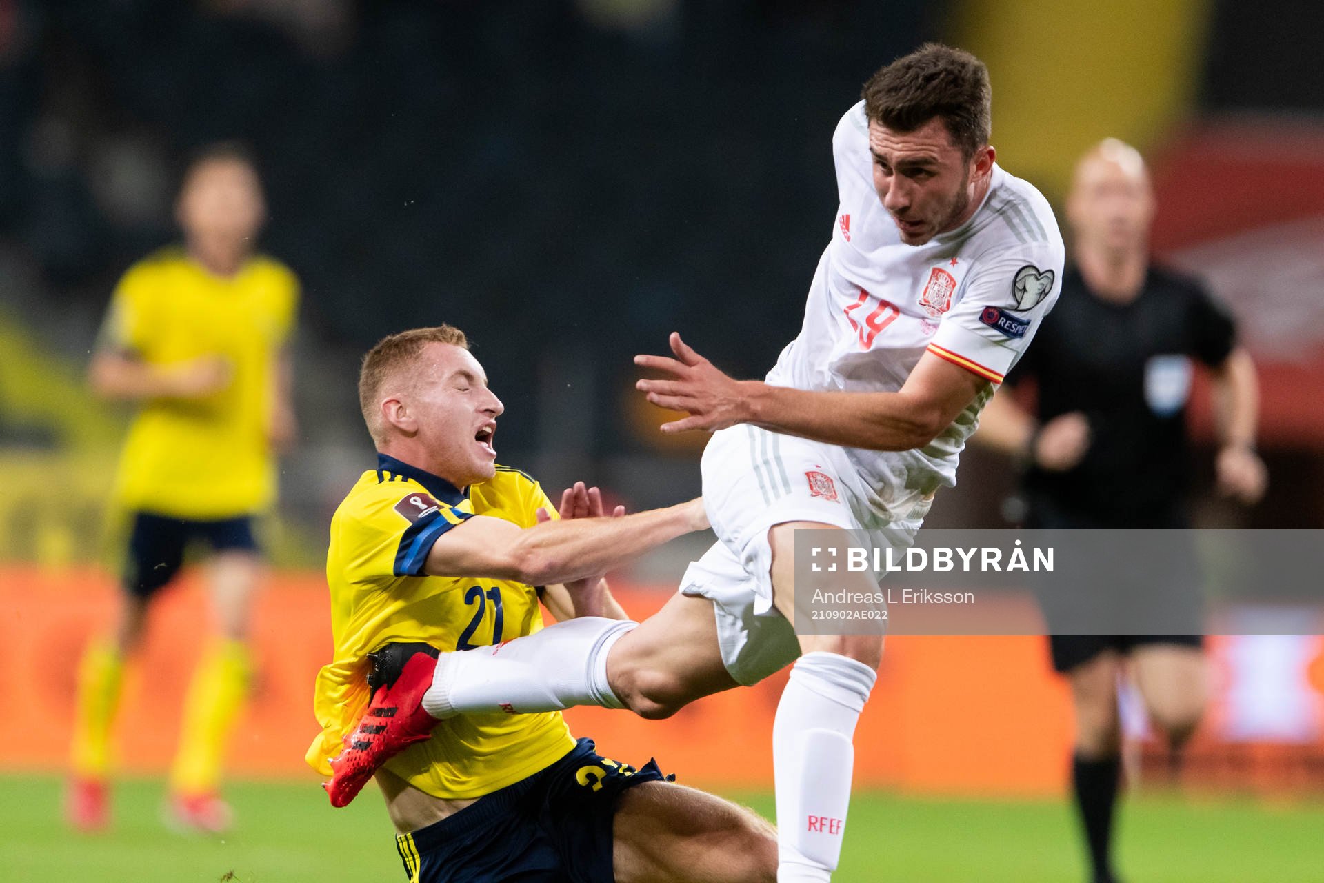 Dejan Kulusevski of Sweden and Aymeric Laporte of Spain