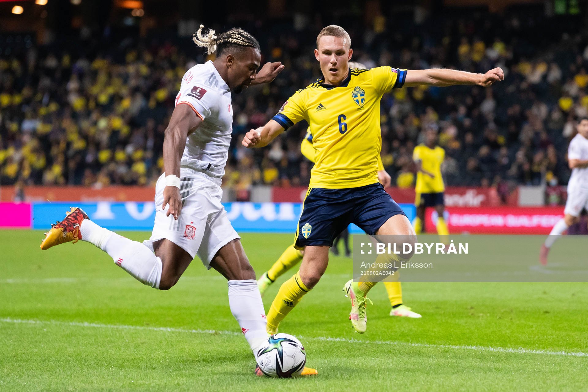 Adama Traore of Spain and Ludwig Augustinsson of Sweden