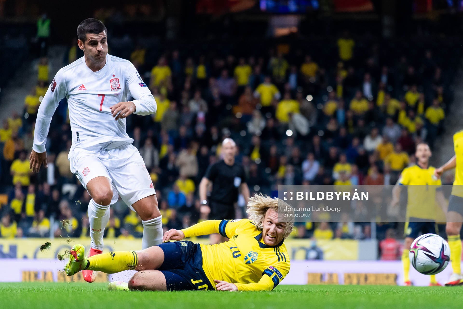 Alvaro Morata of Spain and Emil Forsberg of Sweden