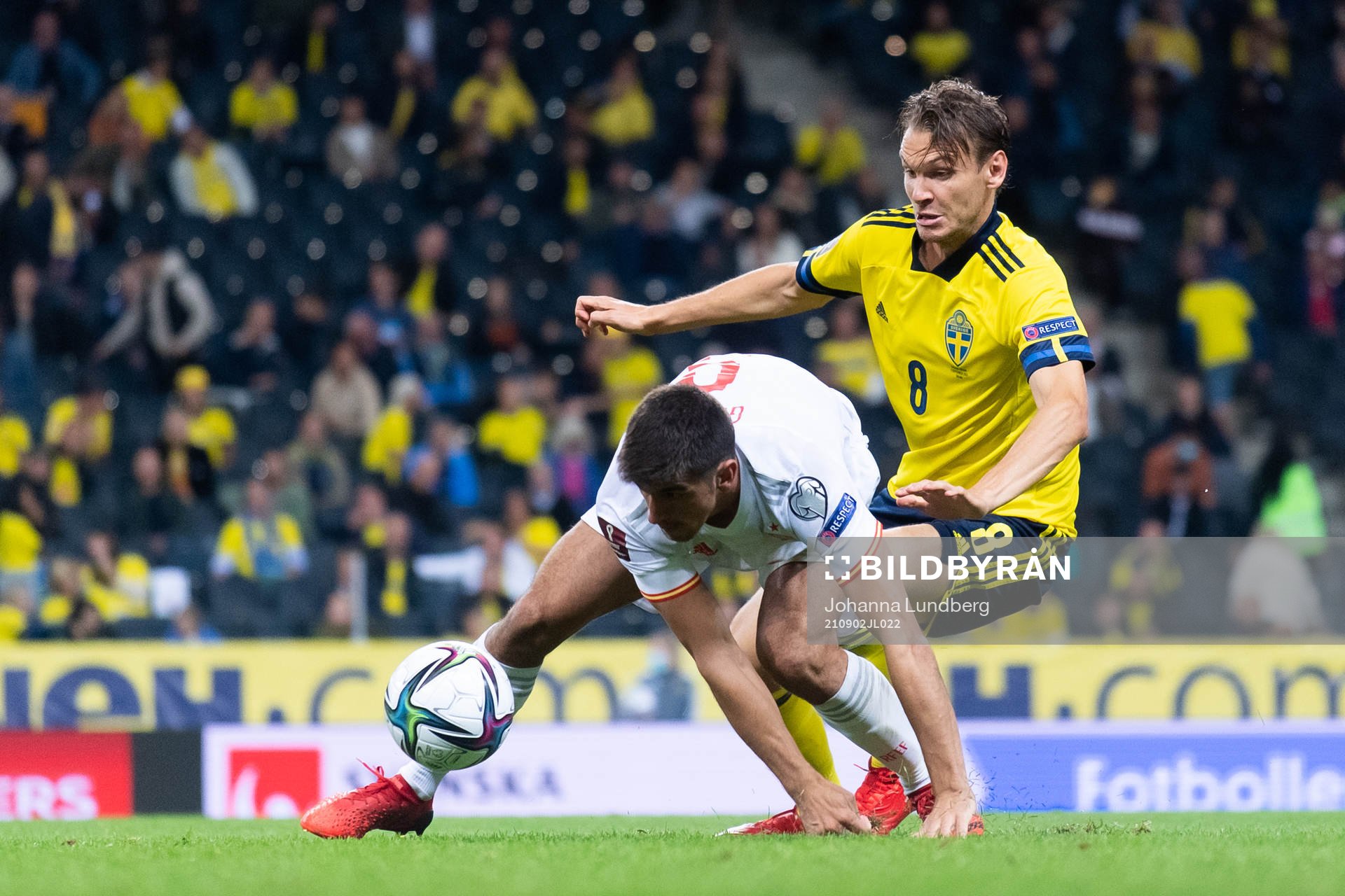 Gerard Moreno of Spain and Albin Ekdal of Sweden