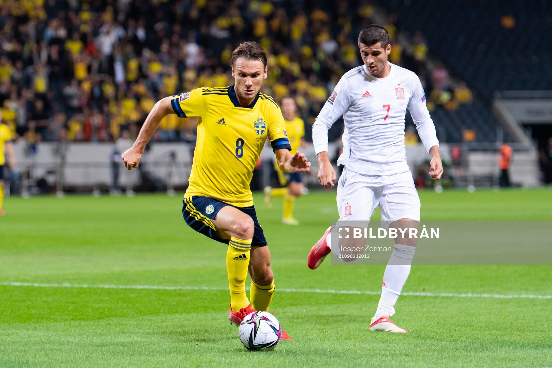 Albin Ekdal of Sweden and Alvaro Morata of Spain