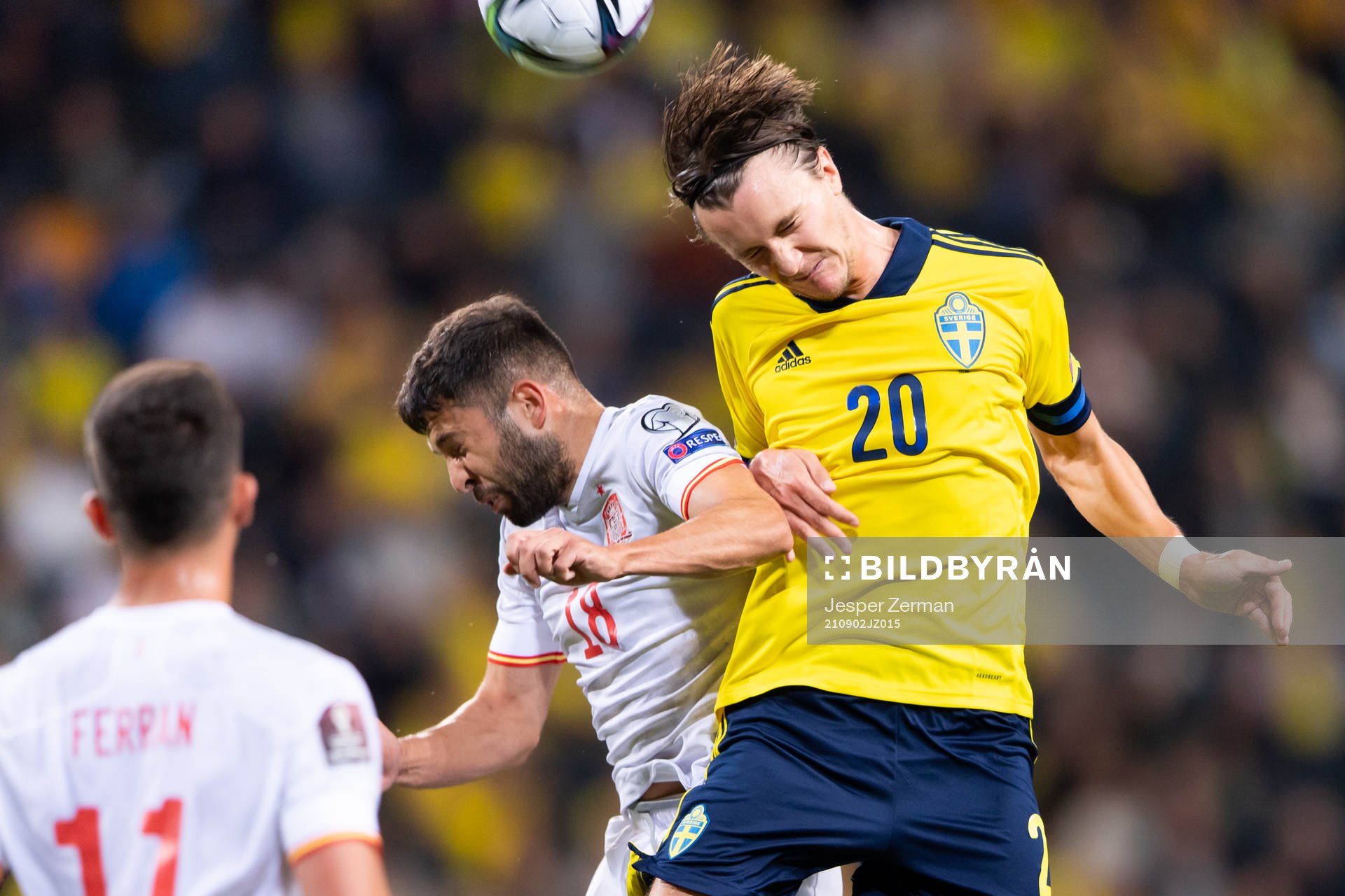 Jordi Alba of Spain and Kristoffer Olsson of Sweden