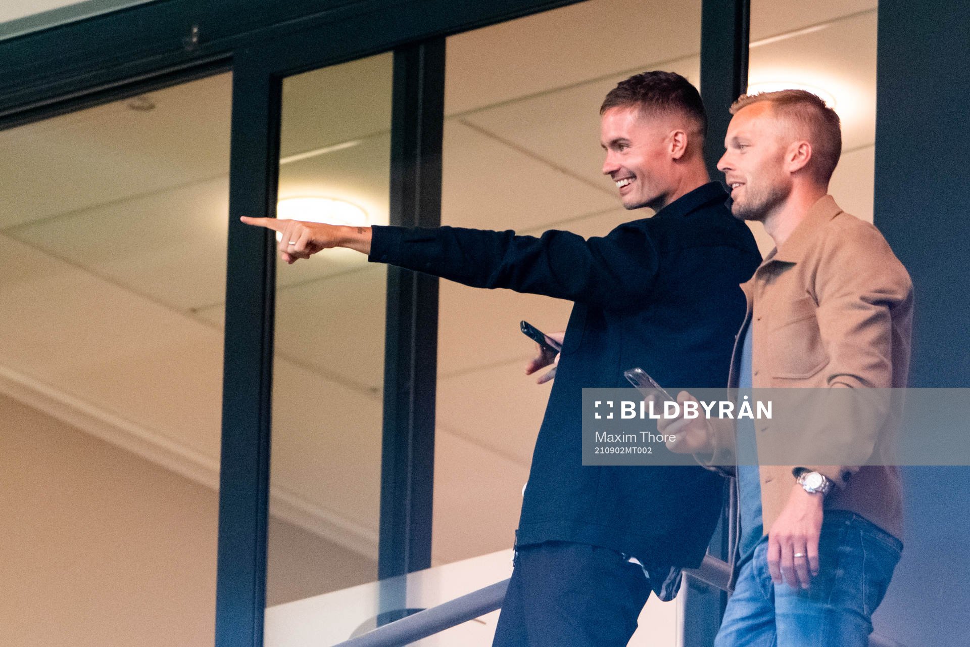 Mikael Lustig and Sebastian Larsson in the stands