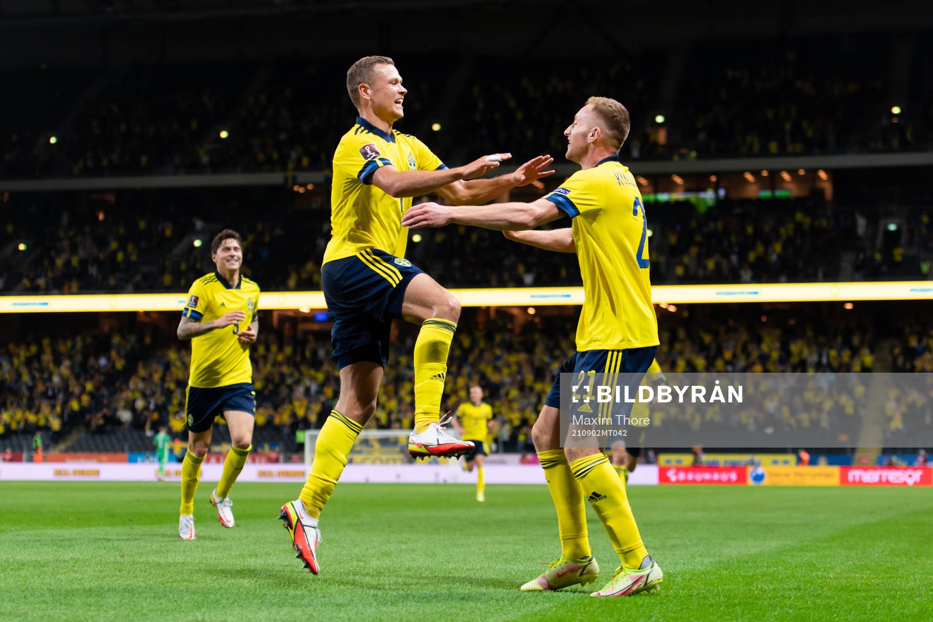 Viktor Claesson and Dejan Kulusevski of Sweden celebrate