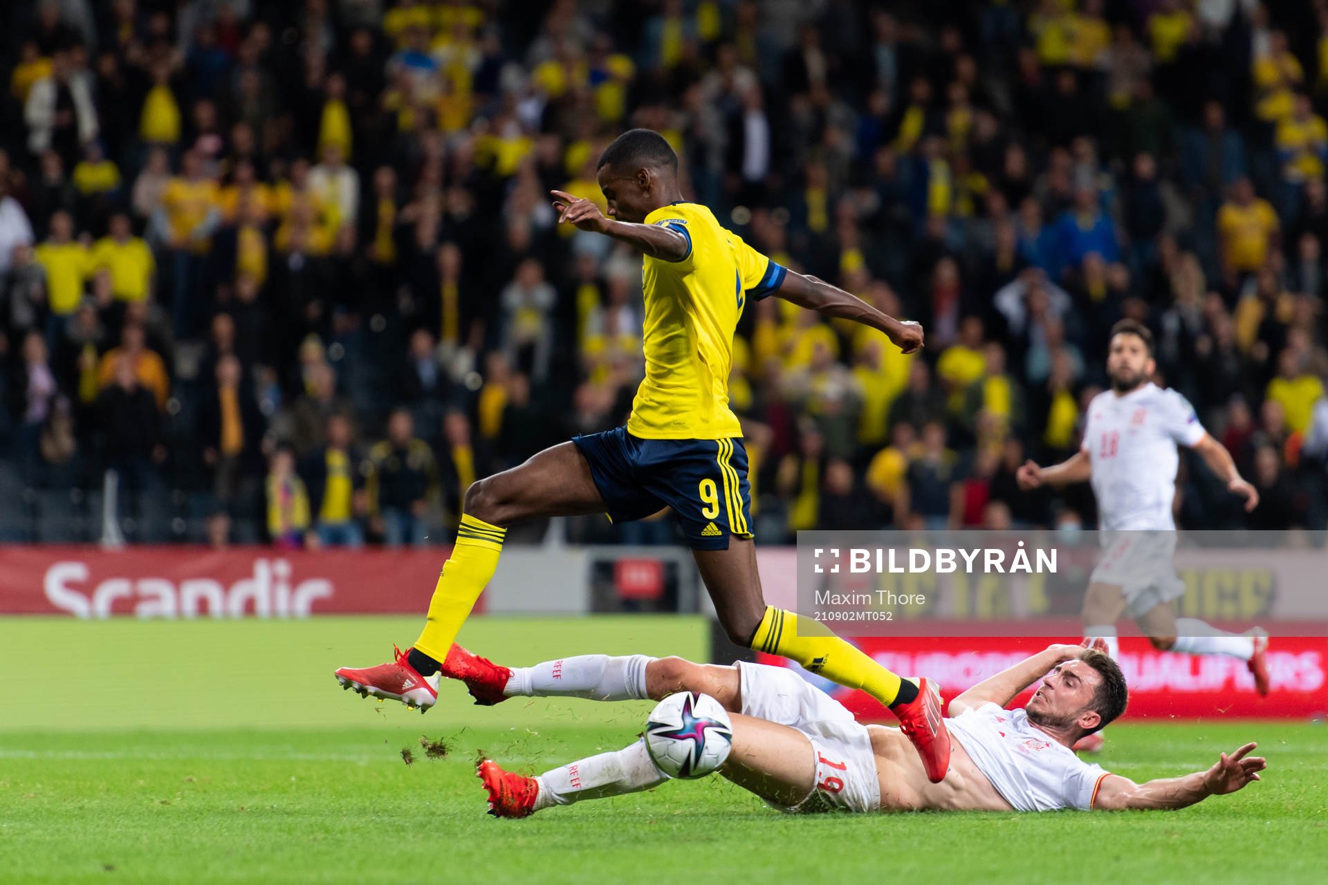 Aymeric Laporte of Spain and Alexander Isak of Sweden