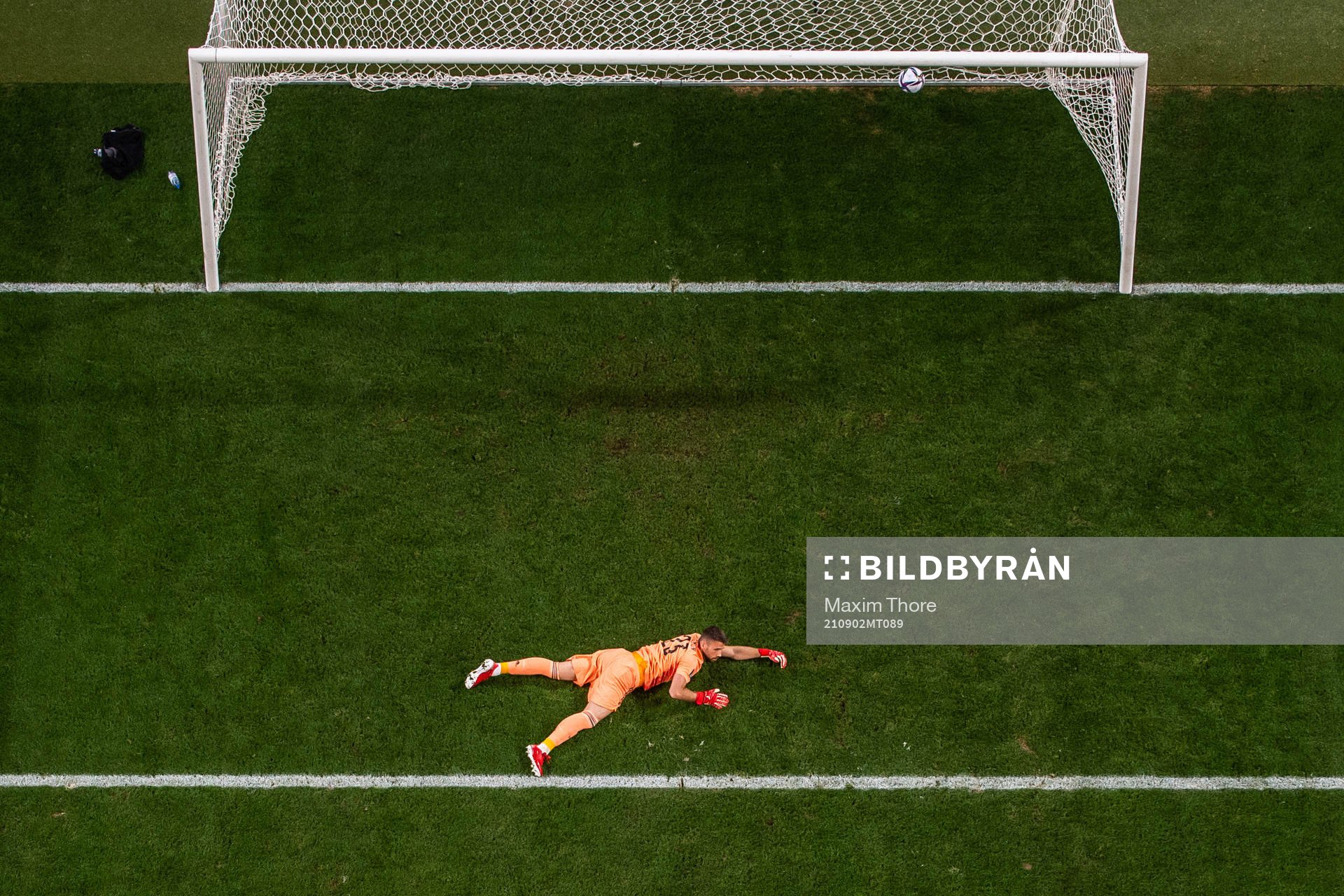 Goalkeeper Unai Simon of Spain looks dejected