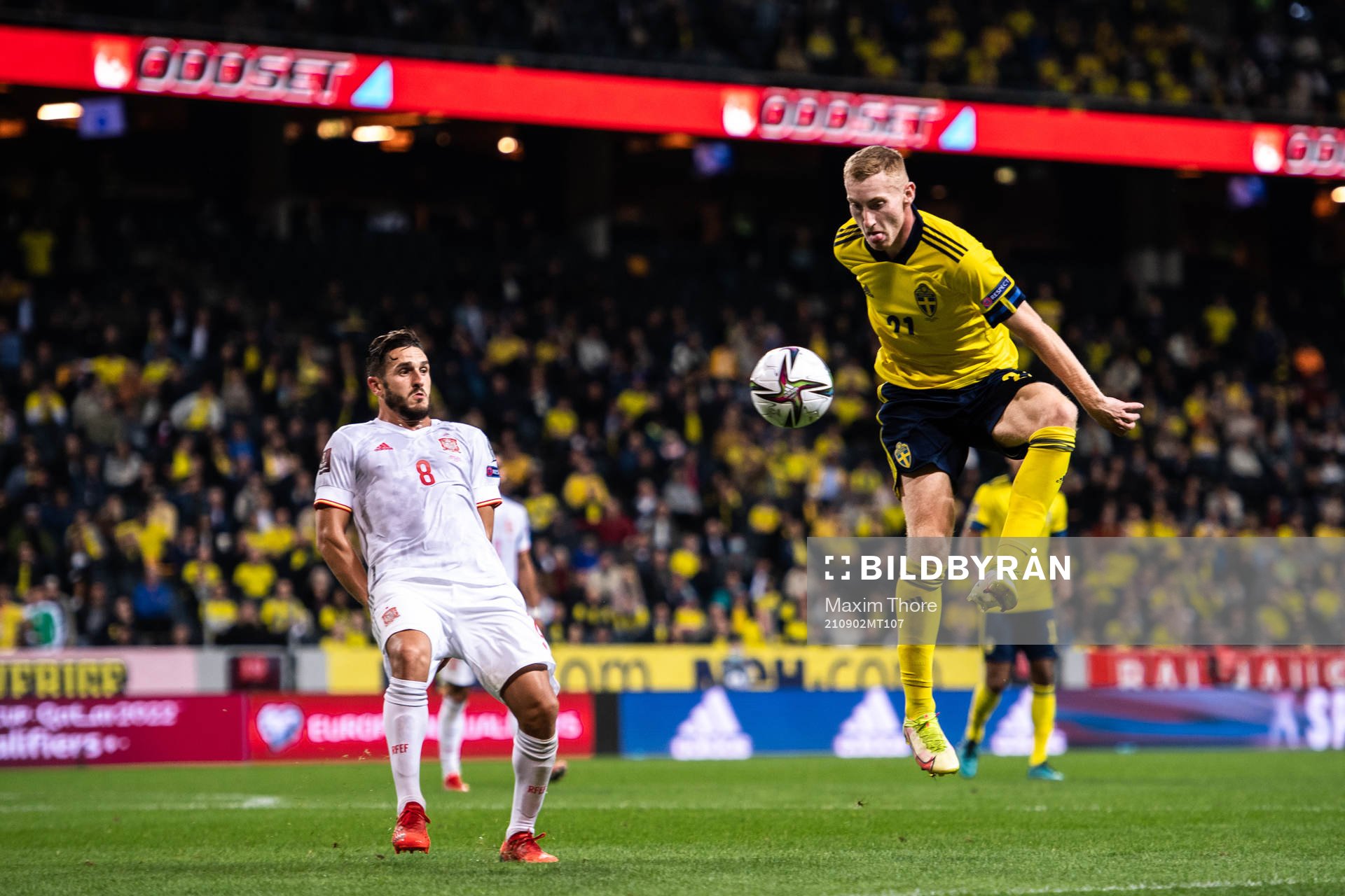 Koke of Spain and Dejan Kulusevski of Sweden