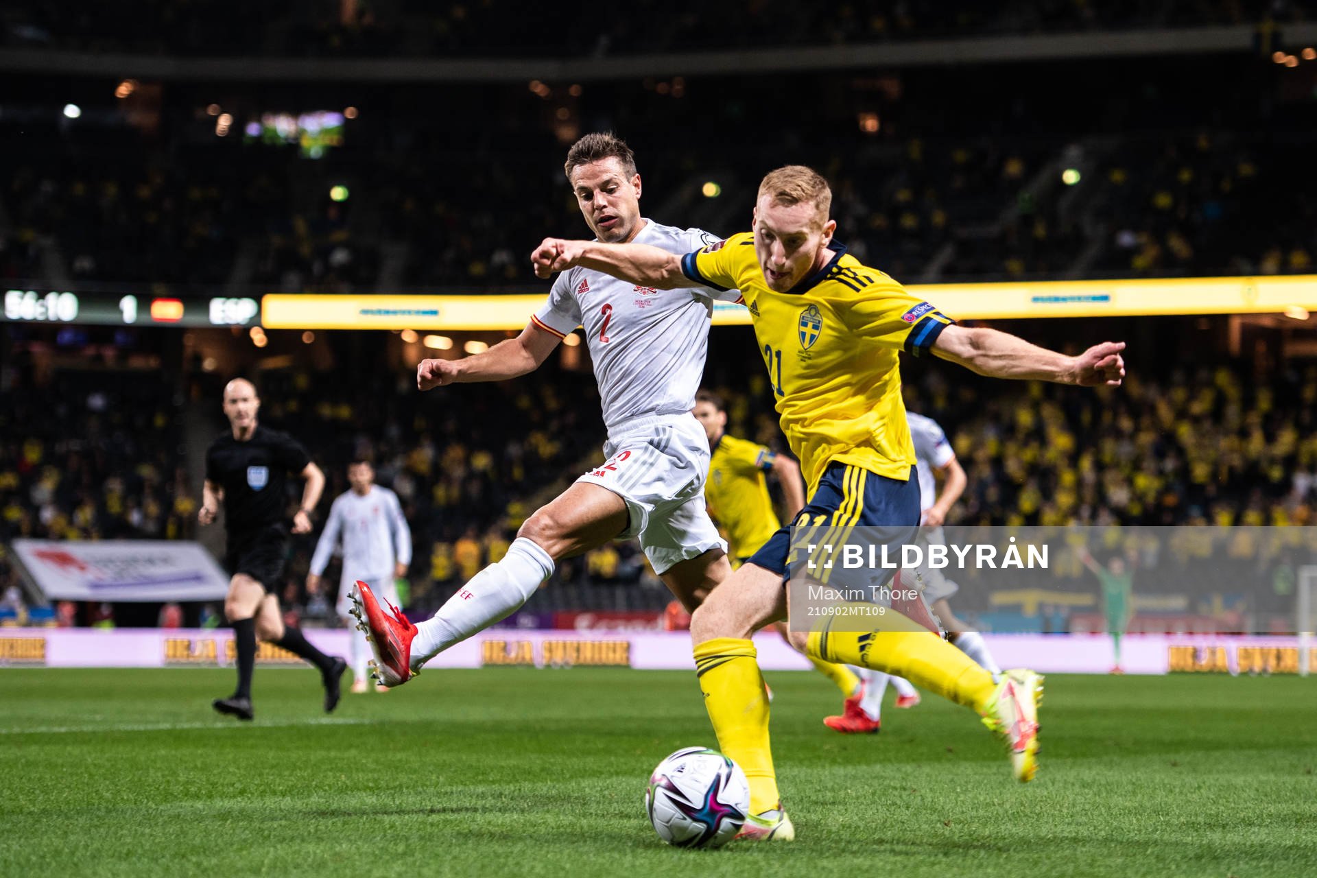 Cesar Azpilicueta of Spain and Dejan Kulusevski of Sweden