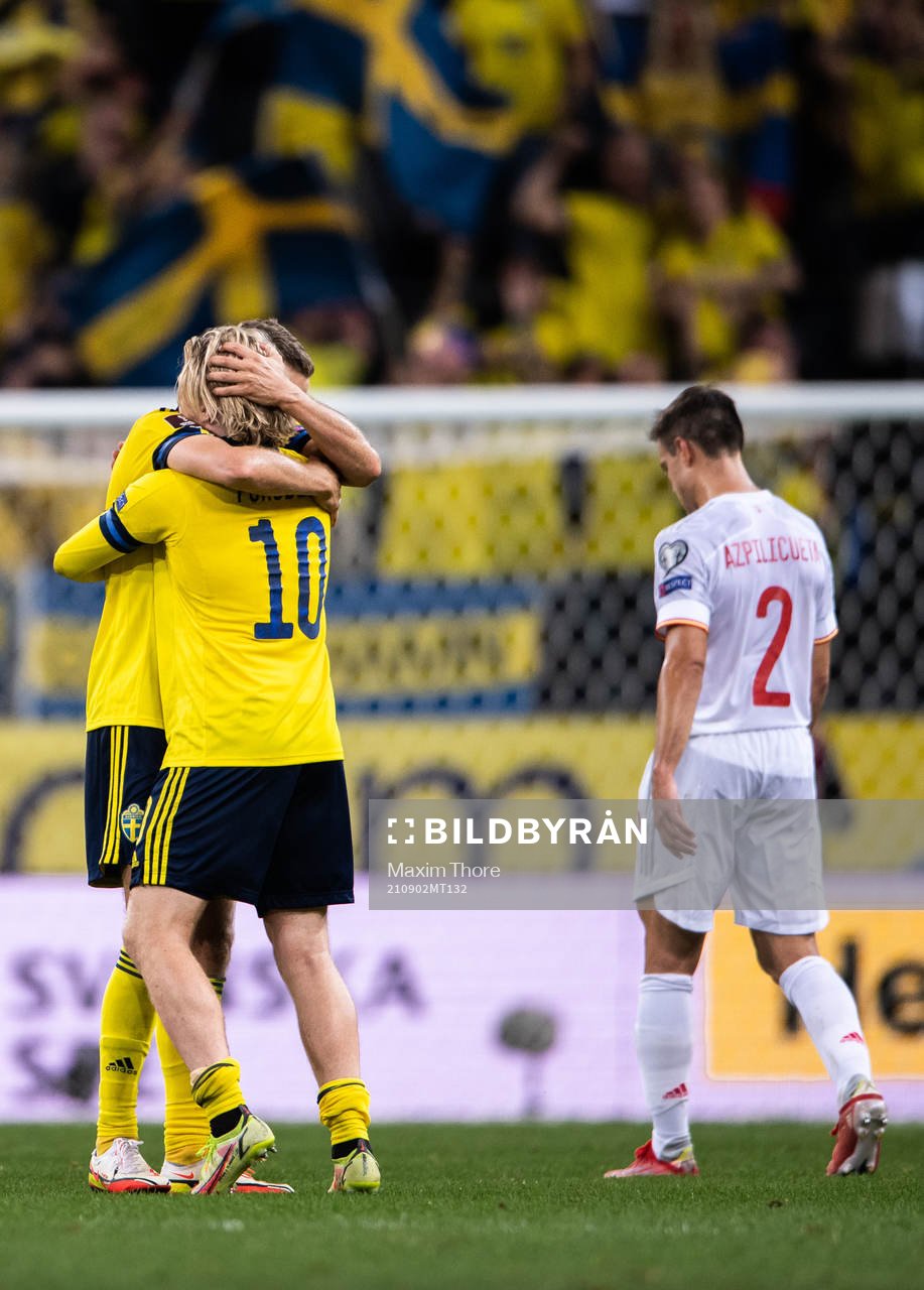 Viktor Claesson and Emil Forsberg of Sweden celebrate