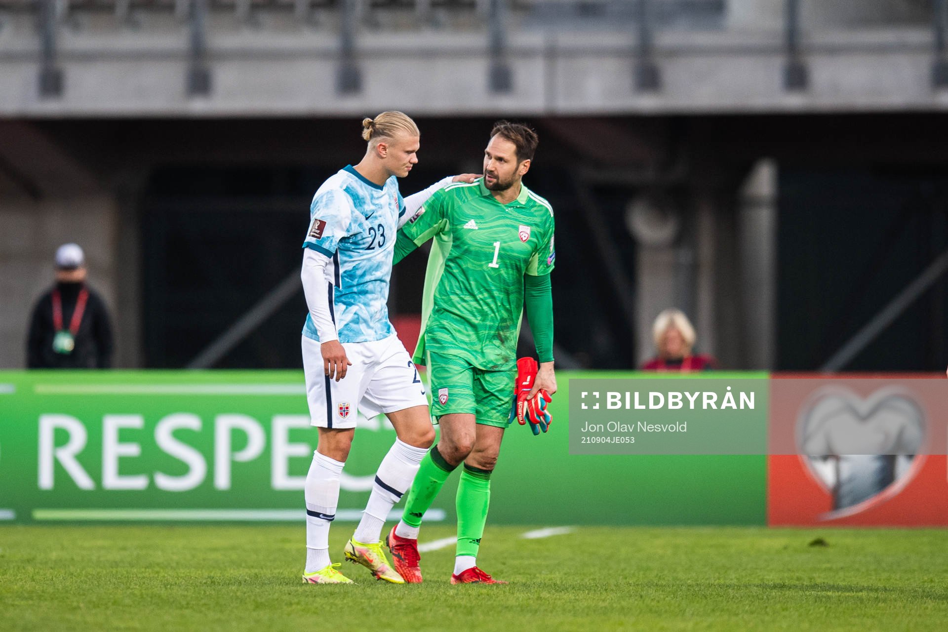 Erling Braut Haaland of Norway and goalkeeper Pavels