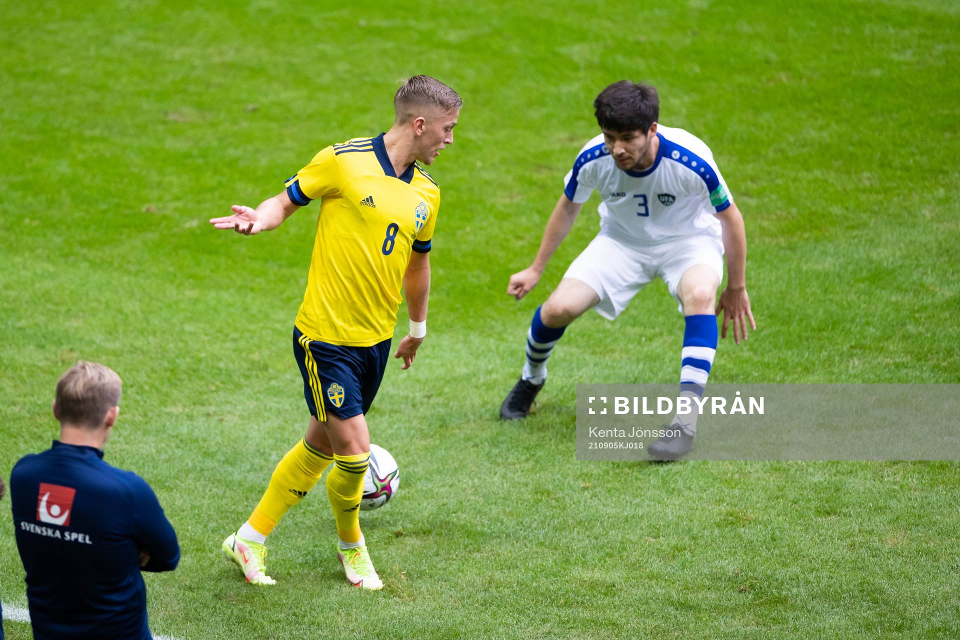 Jesper Karlsson of Sweden and Khojiakbar Alijonovof