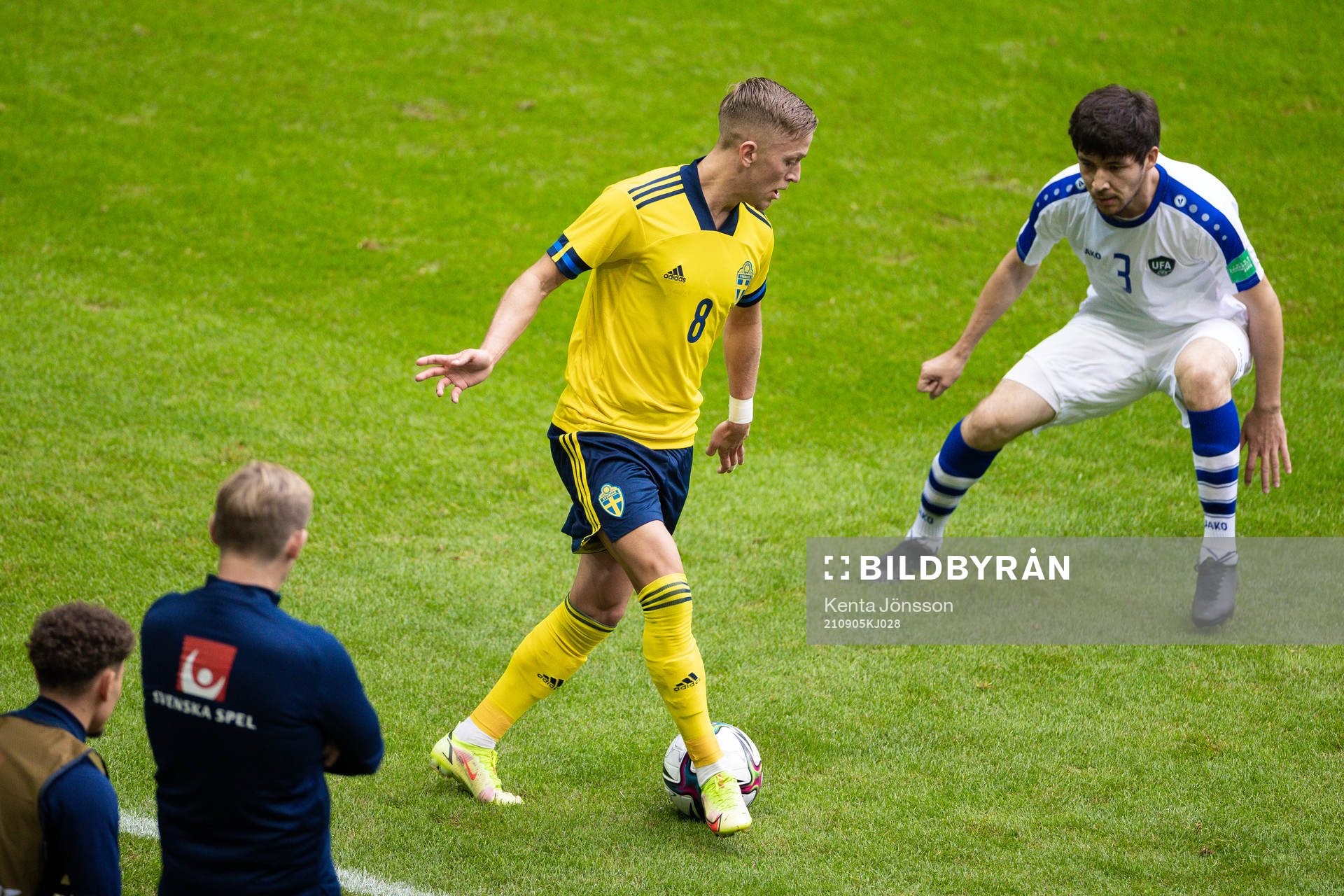 Jesper Karlsson of Sweden and Khojiakbar Alijonovof