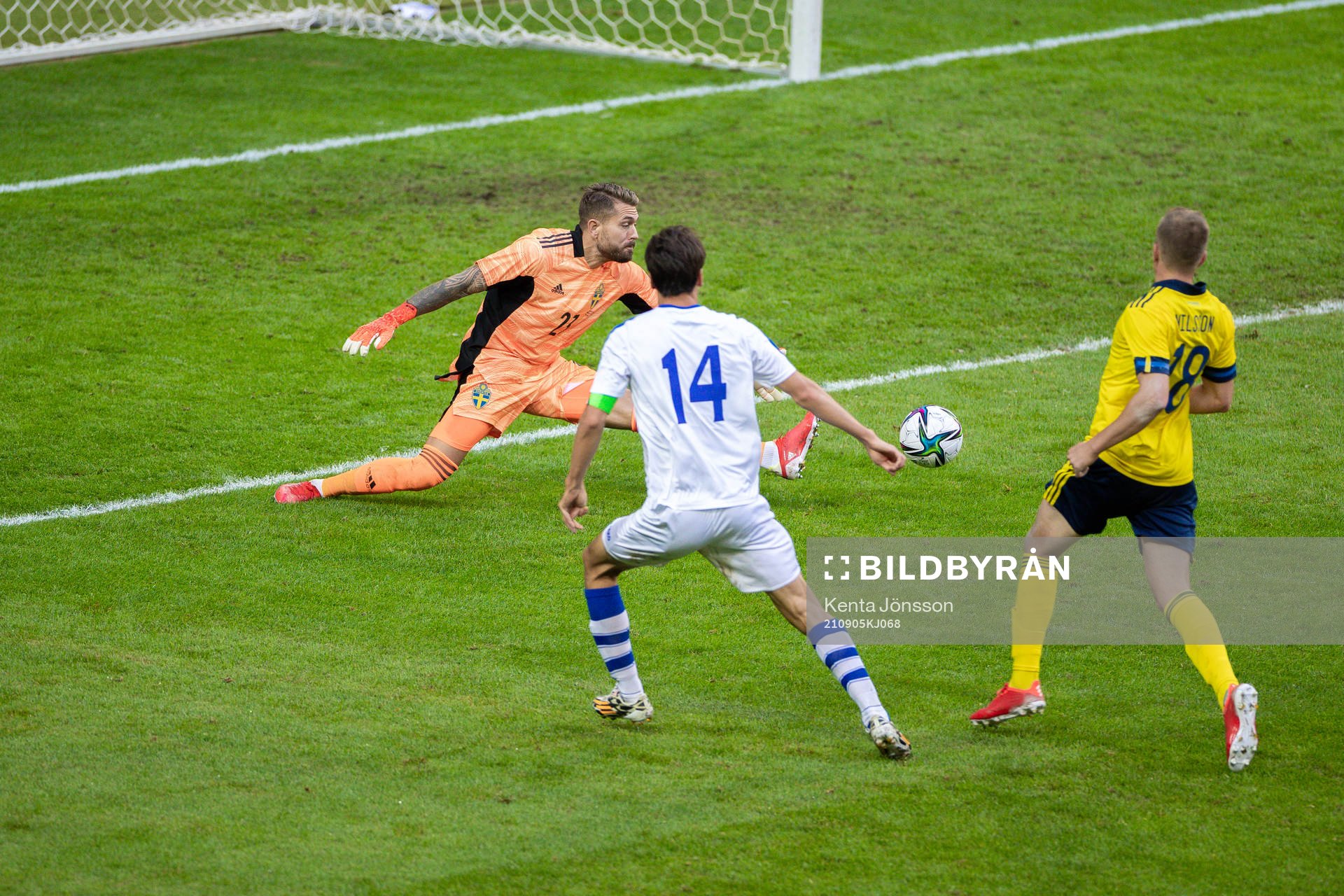 Eldor Shomurodov of Uzbekistan scores 2-1 behind goalkeeper
