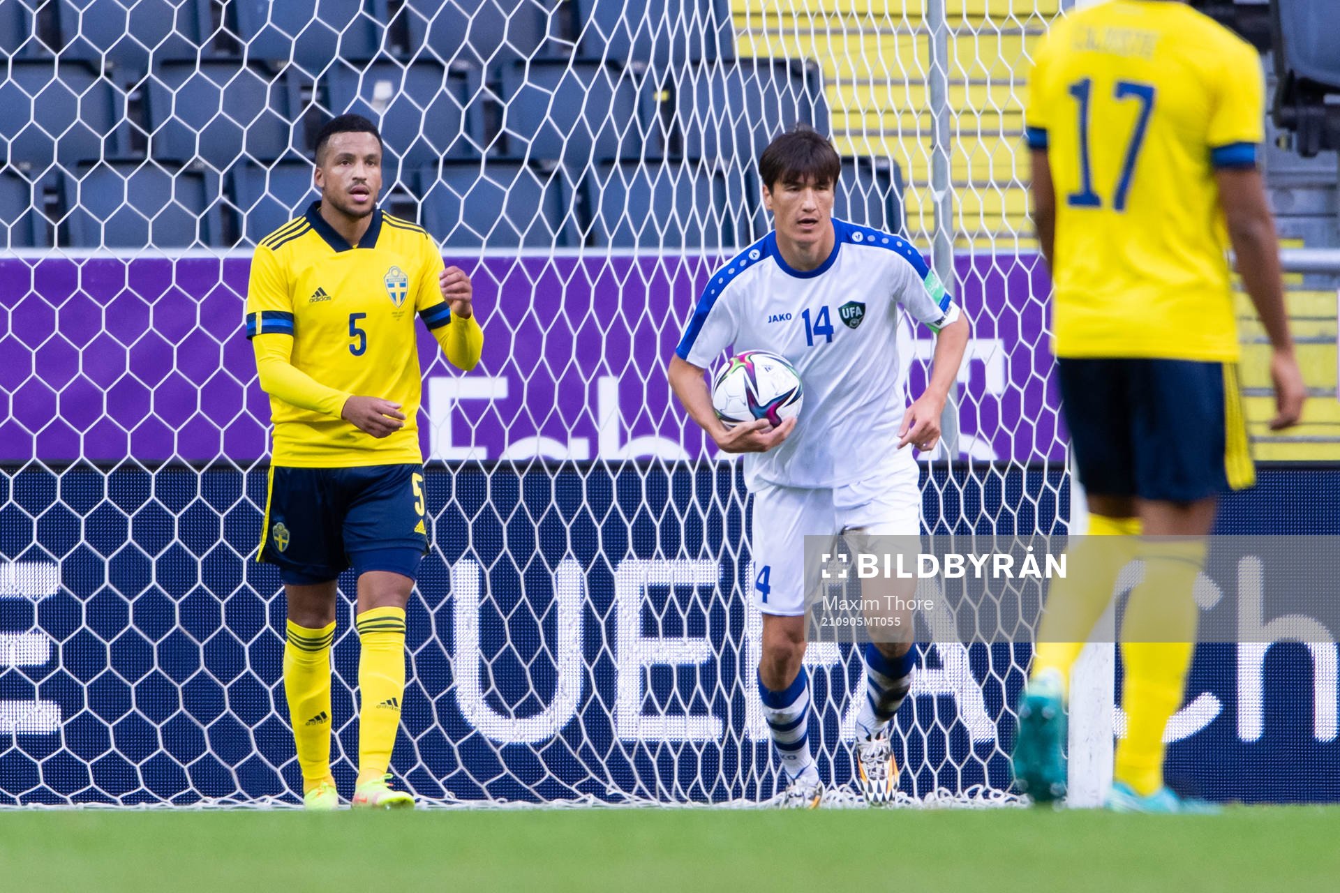 Martin Olsson of Sweden and Eldor Shomurodov of Uzbekistan