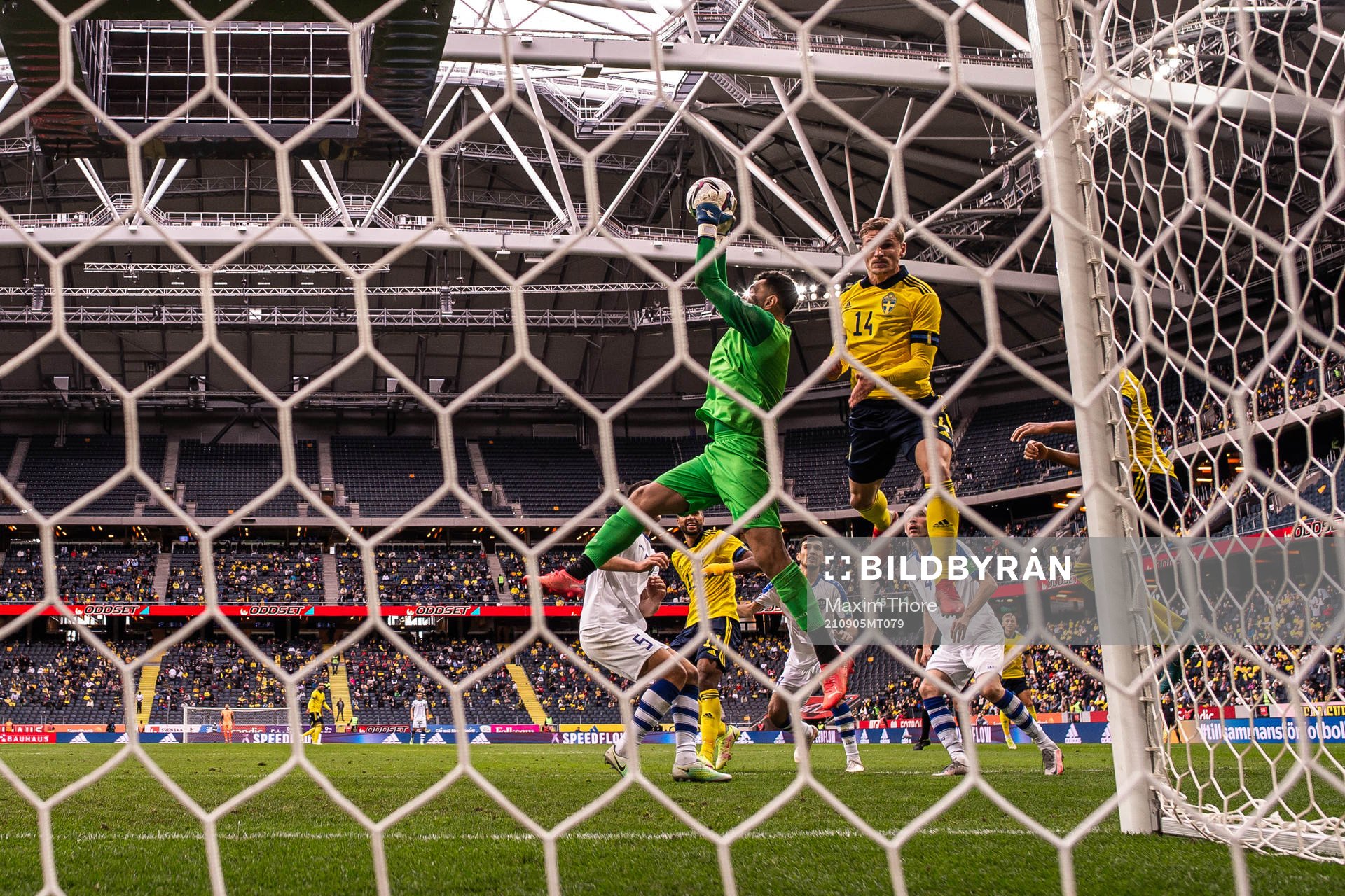Goalkeeper Eldorbek Suyunov of Uzbekistan with a save