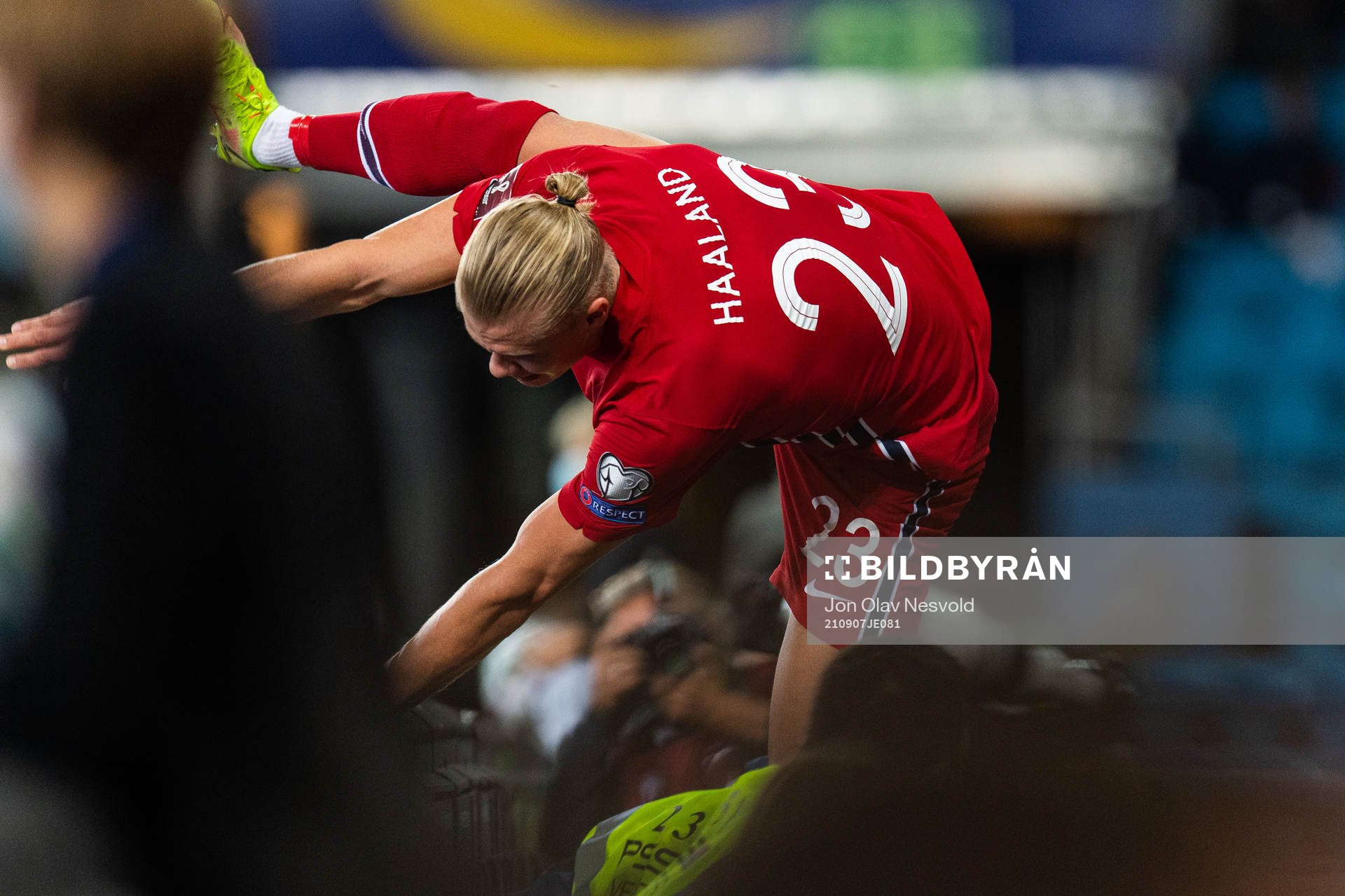 Erling Braut Haaland of Norway jumps over the advertising