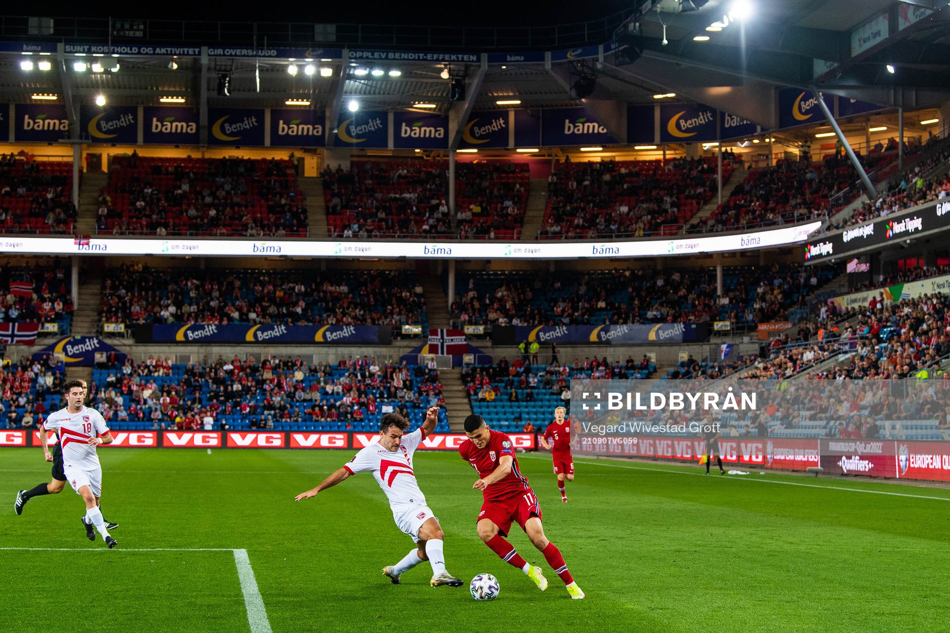 Ethan Jolley of Gibraltar and Mohamed Elyounoussi of Norway