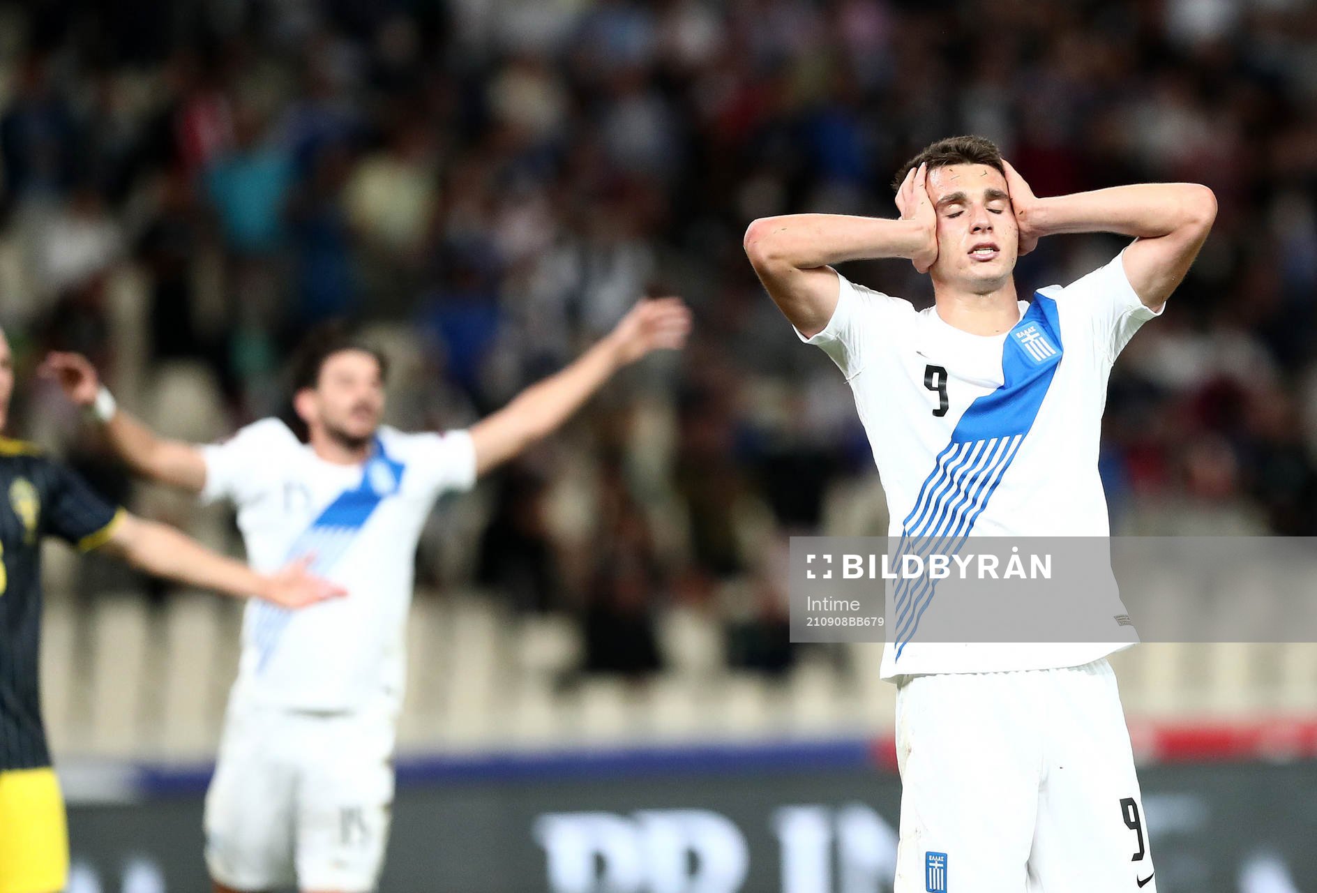 Anastasios Douvikas of Greece looks dejected