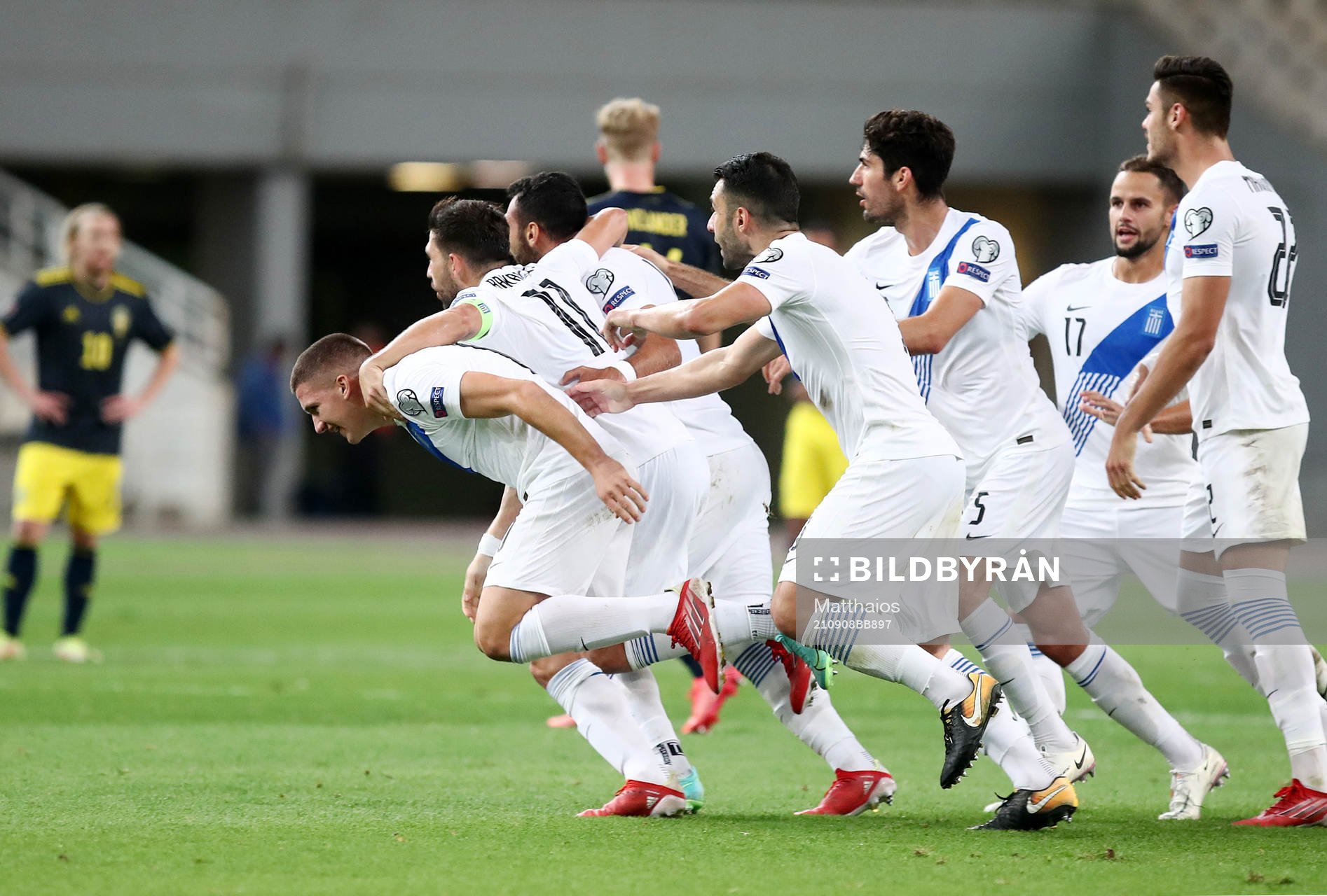 Players of Greece celebrate after the 2-0 goal during the FIFA World Cup Qualifying football match between Greece and Sweden on September 8, 2021 in Athens.