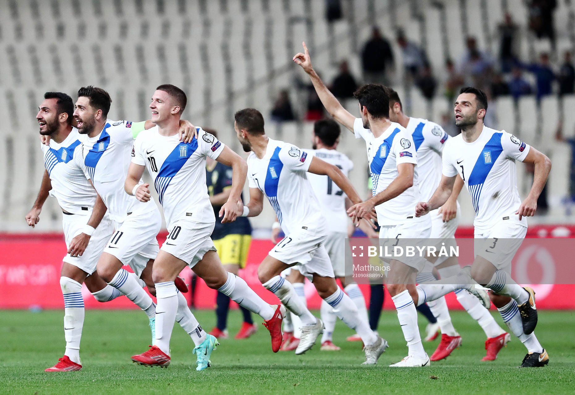 Vangelis Pavlidis of Greece celebrate with teammates after the 2-0 goal during the FIFA World Cup Qualifying football match between Greece and Sweden on September 8, 2021 in Athens.