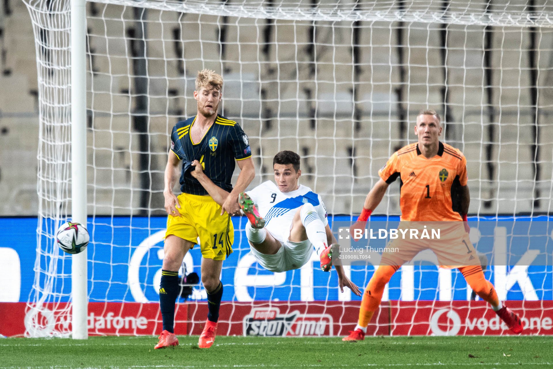 Filip Helander and goalkeeper Robin Olsen of Sweden against
