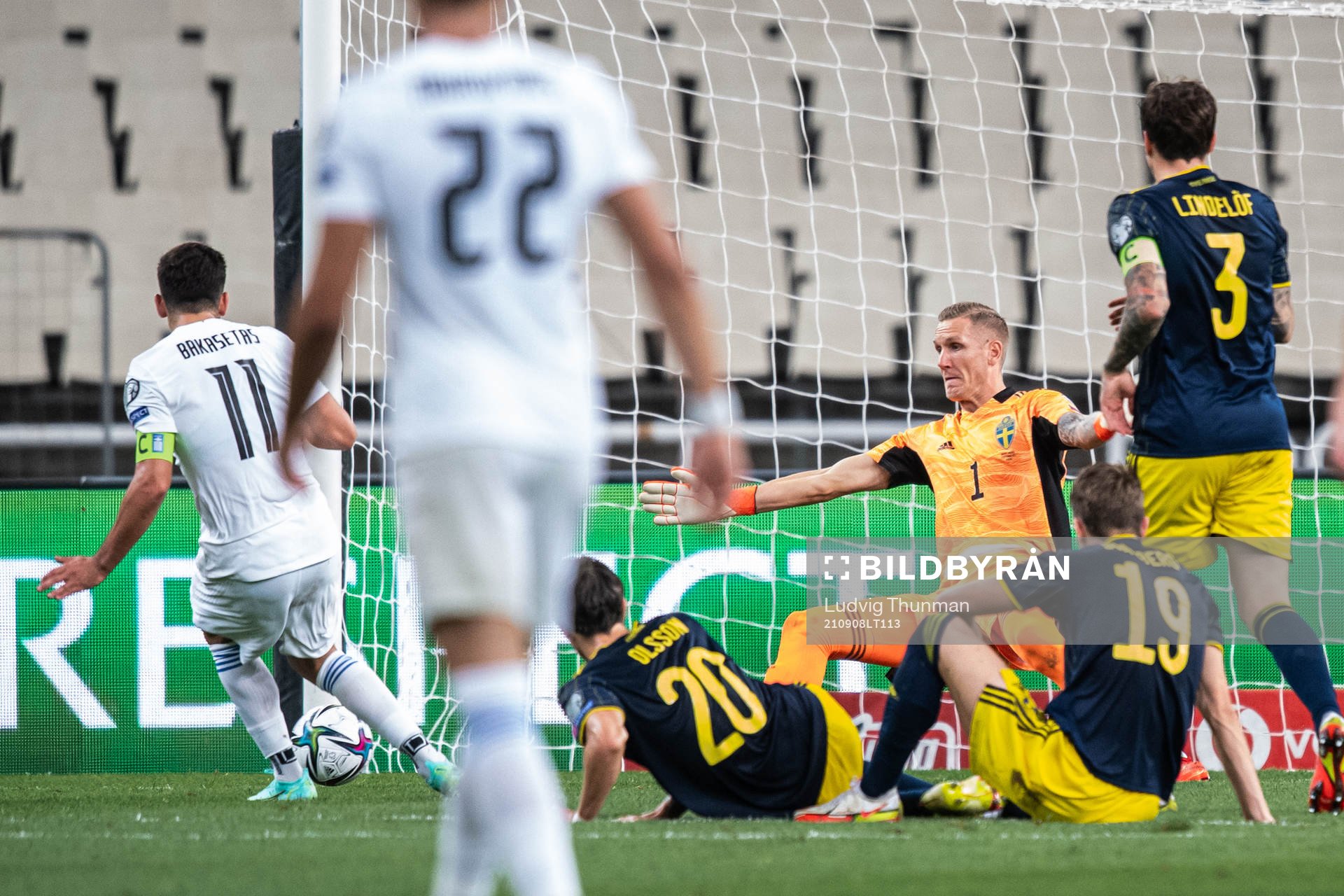 Tasos Bakasetas of Greece score the 1-0 goal behind