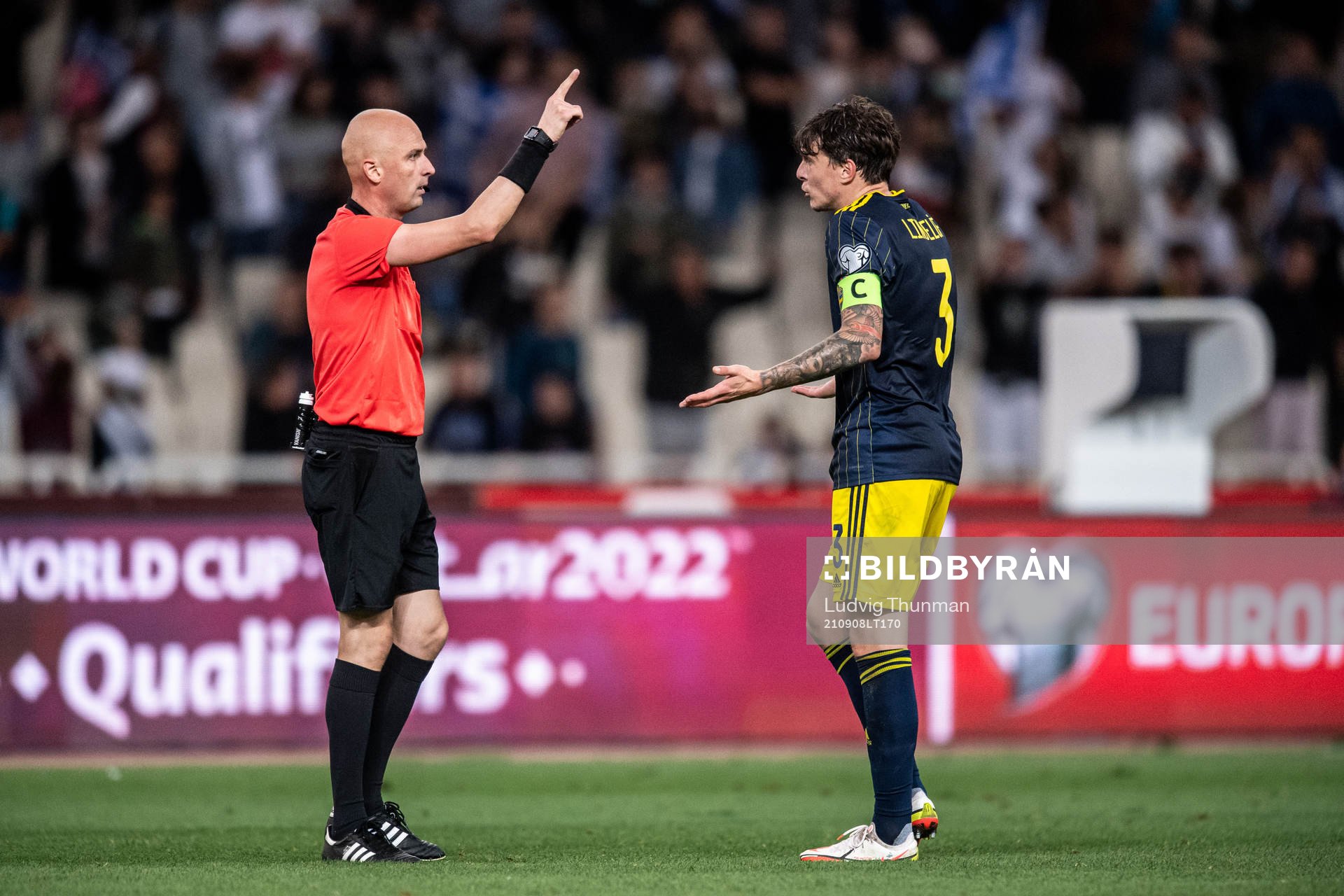 Referee Sergei Karasev and Victor Nilsson Lindelöf of