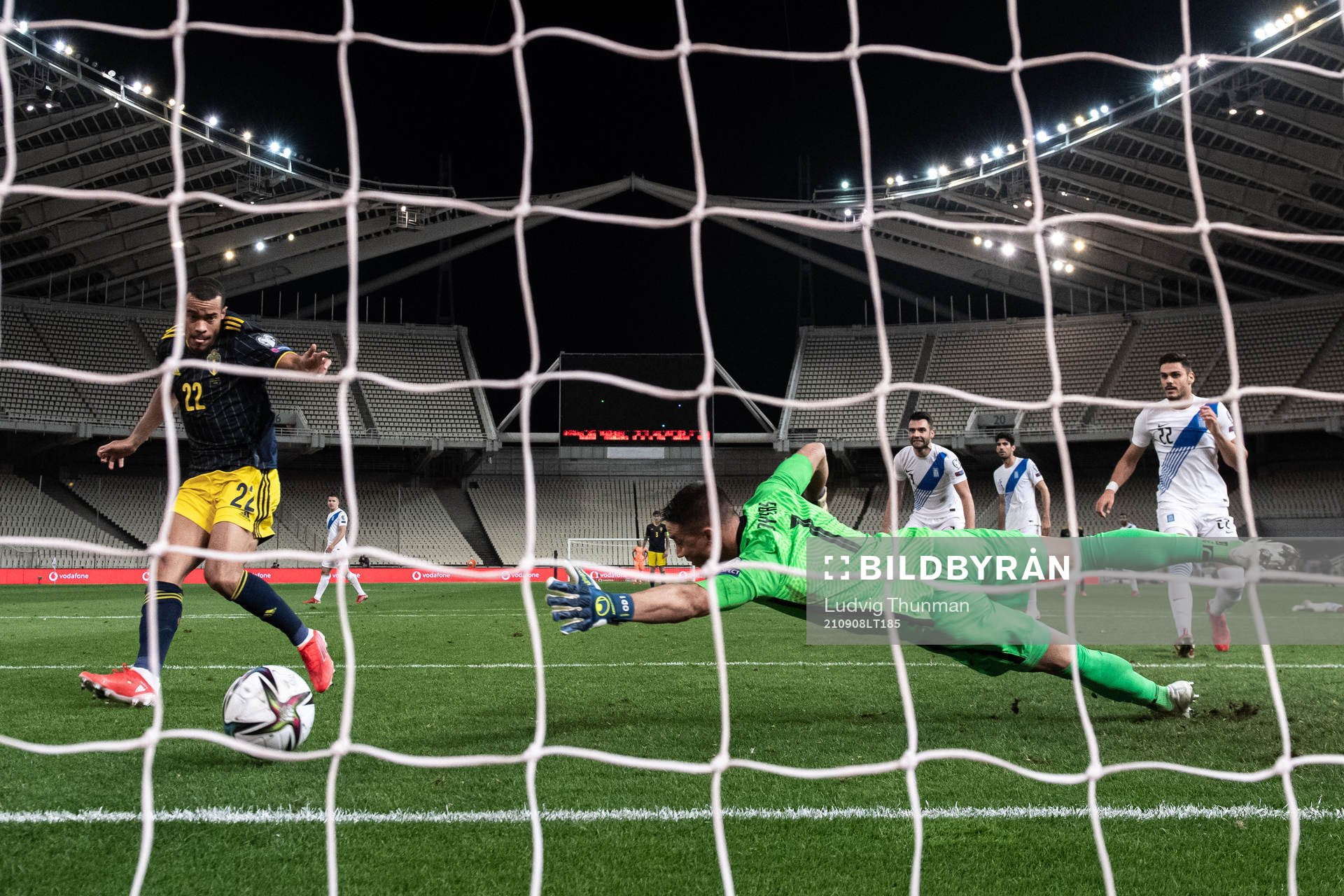 Robin Quaison of Sweden scores the 2-1 goal behind