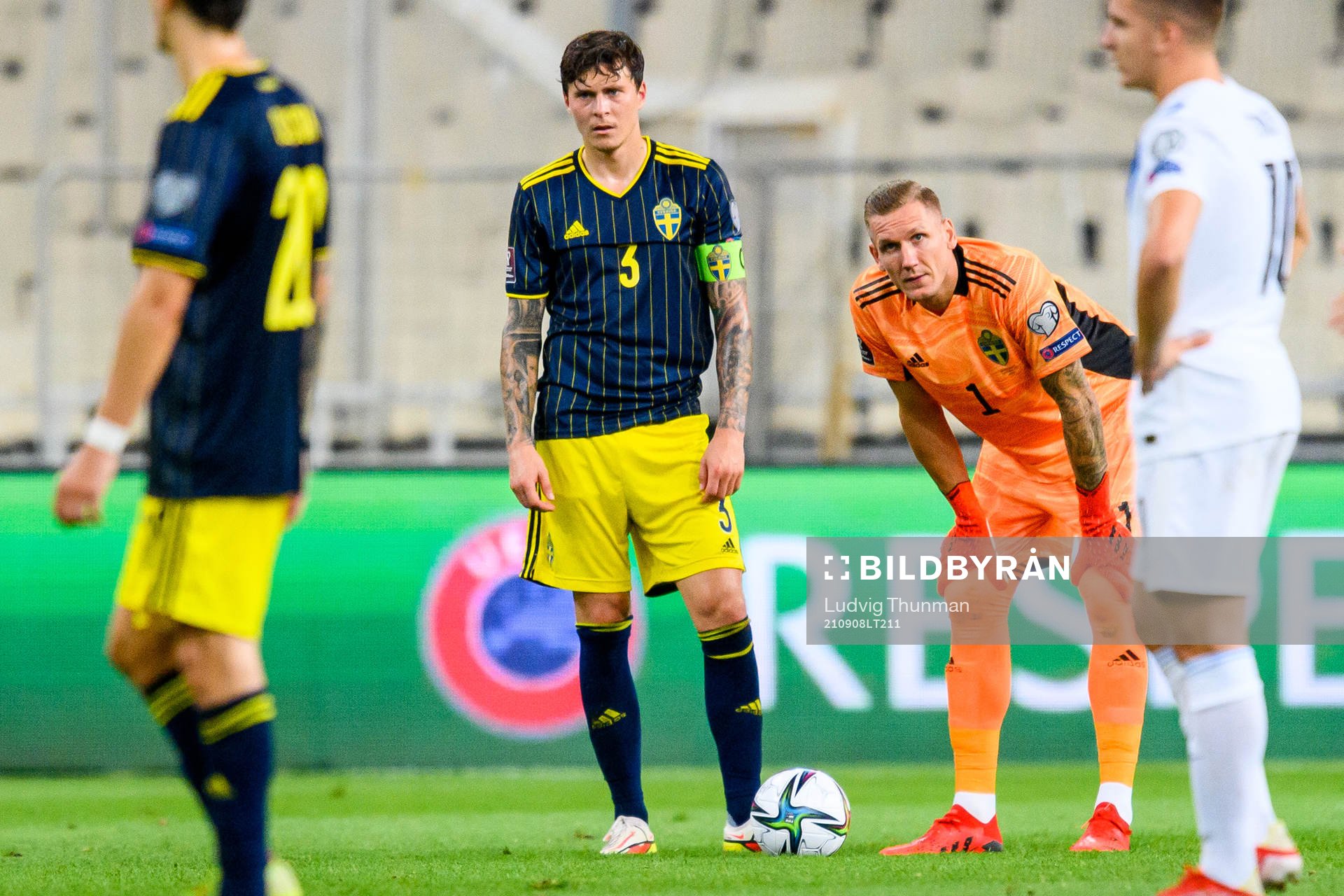 Victor Nilsson Lindelöf and goalkeeper Robin Olsen of